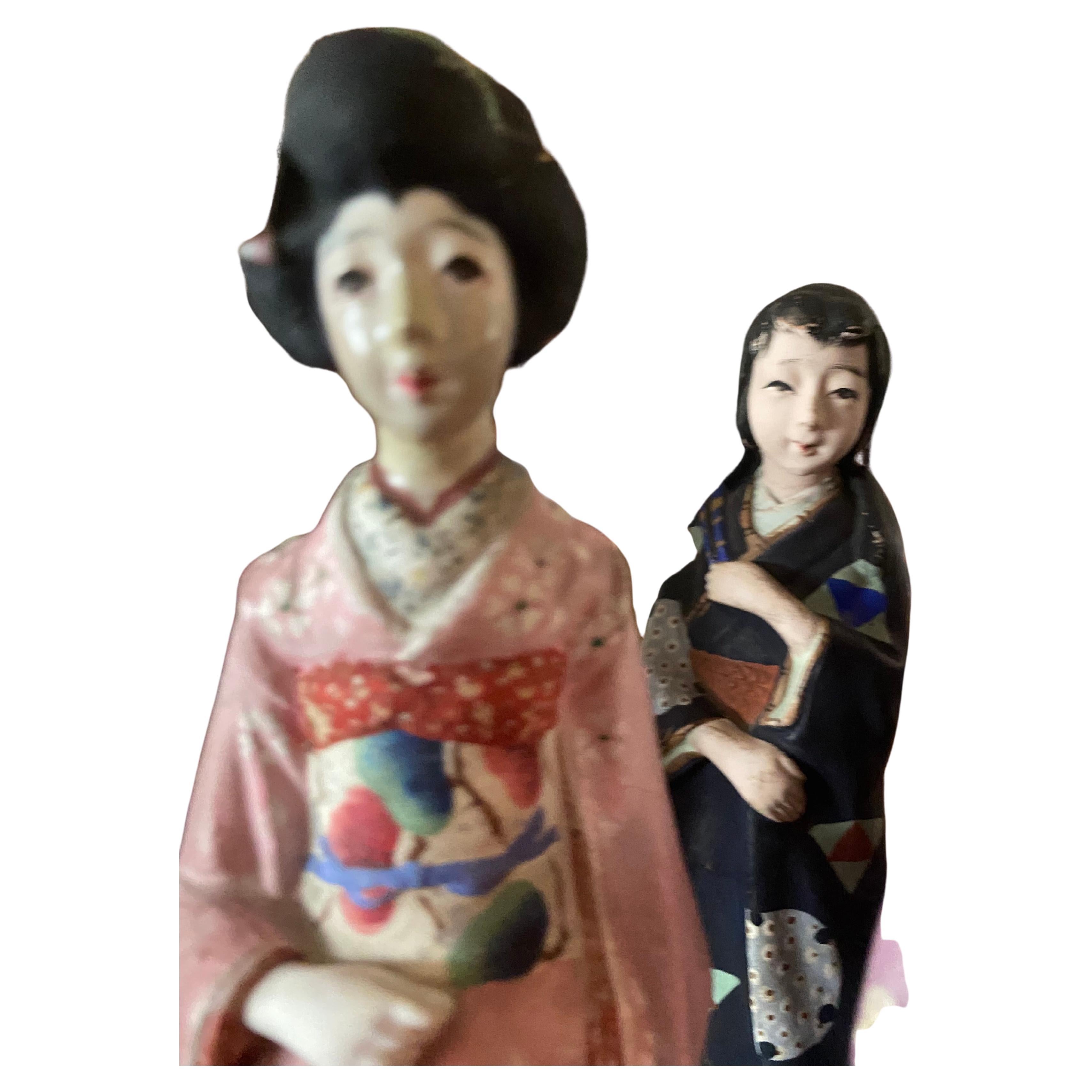 An unique set of Japanese figurines of 9. Very decorative.

3 figurines are 25 cm high
5 are 22 cm high
And the sitting is 18 cm