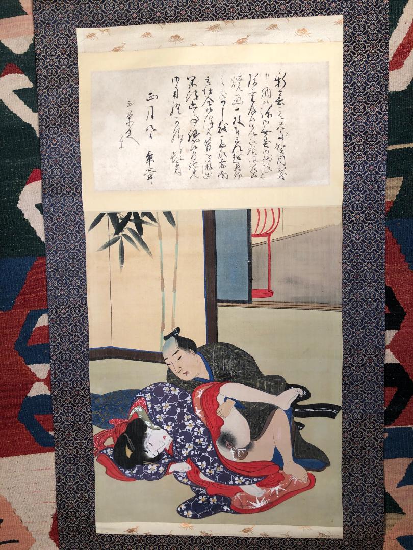 From our most recent Japanese Acquisitions Travels.

This authentic Japanese hand painted Shunga erotic scene on silk scroll is an elusive one of a kind. According to reliable sources, this artist's works are known but few hanging scrolls like this