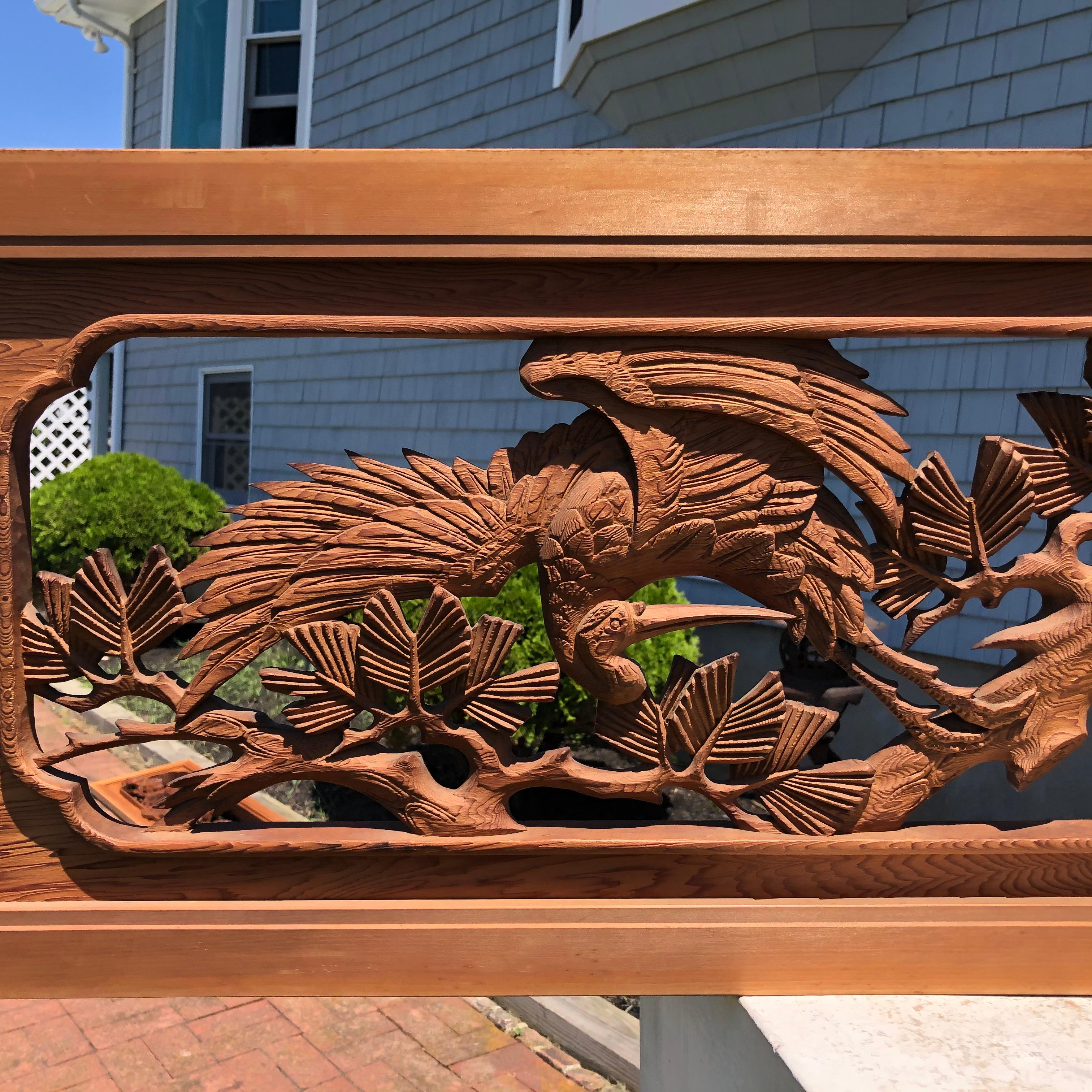 Japan, a fine hand carved wooden screen 