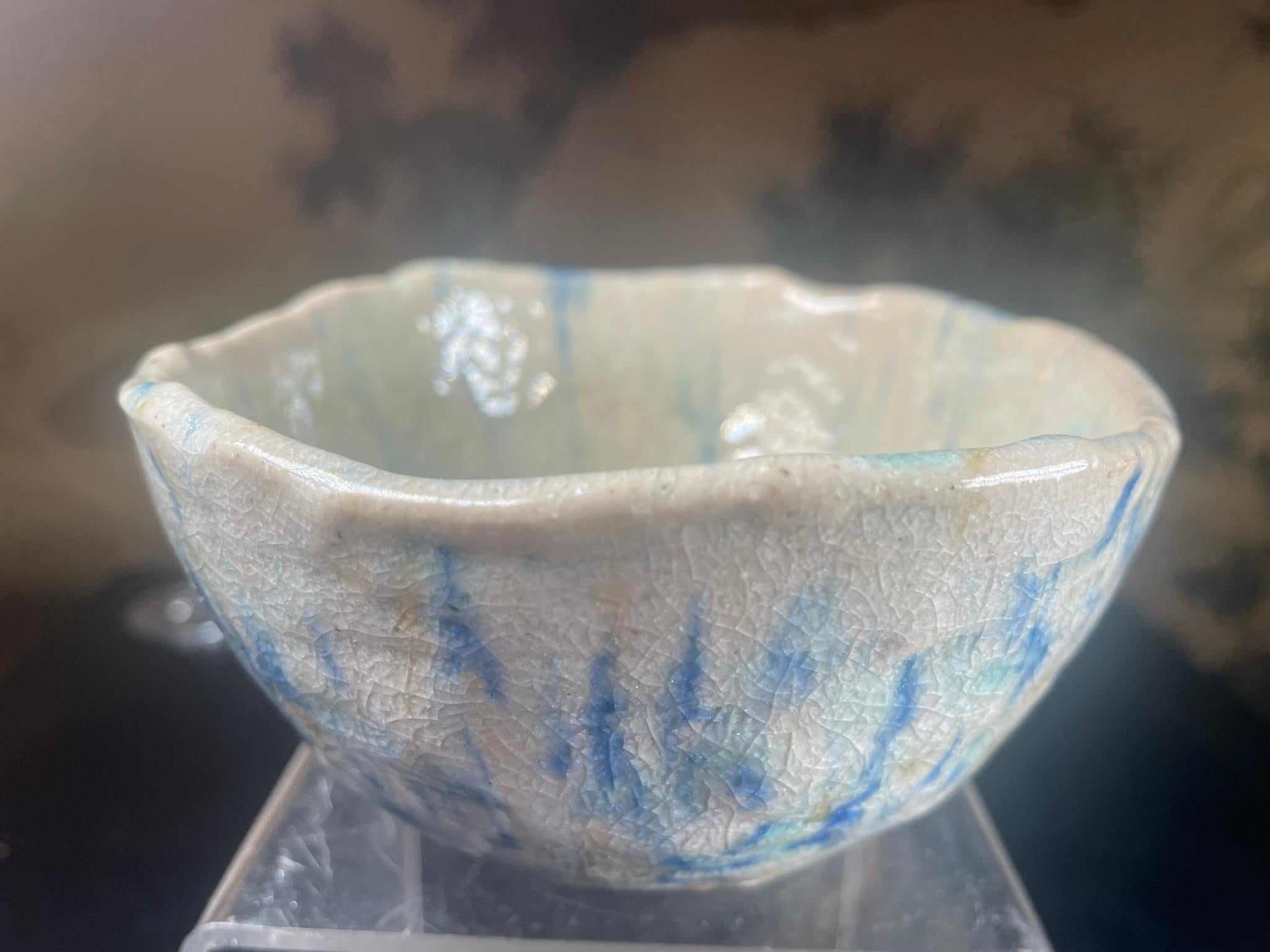 Mint Shozan tea bowl, Akatsu ware,

Blue Impressions. 

From Japan, a beautiful hand-built, painted and glazed, Akatsu ware tea bowl in an impressive Picasso like impressionistic motif created in the 1930's.- over fifty years ago.

A stunning medium