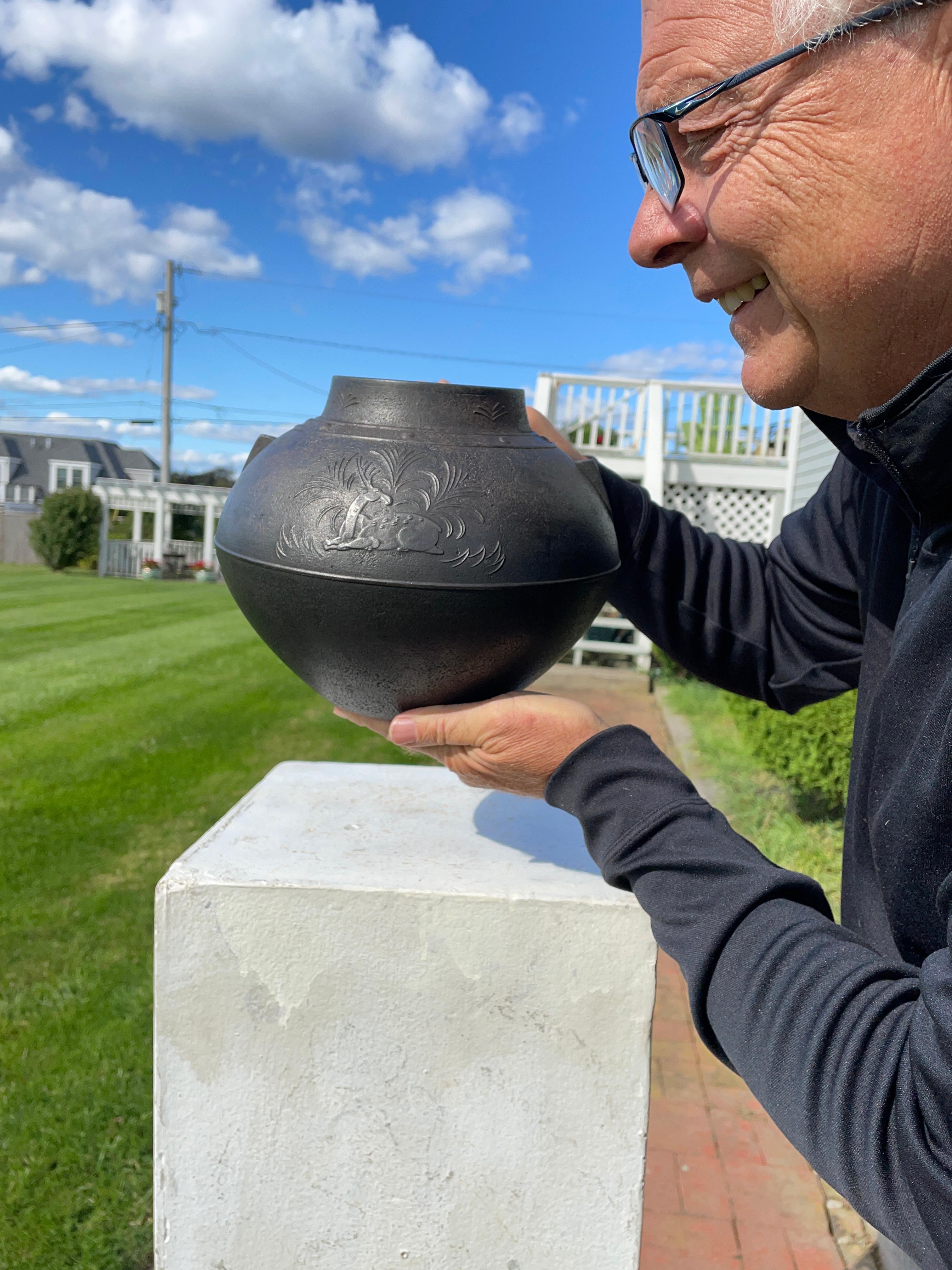 From our recent Japanese Acquisitions - A Treasure From A National Treasure's Teacher

Comes this Japanese large extremely finely detailed cast iron vessel with wonderful relief band designs of beautifully articulated seated male spotted deer on