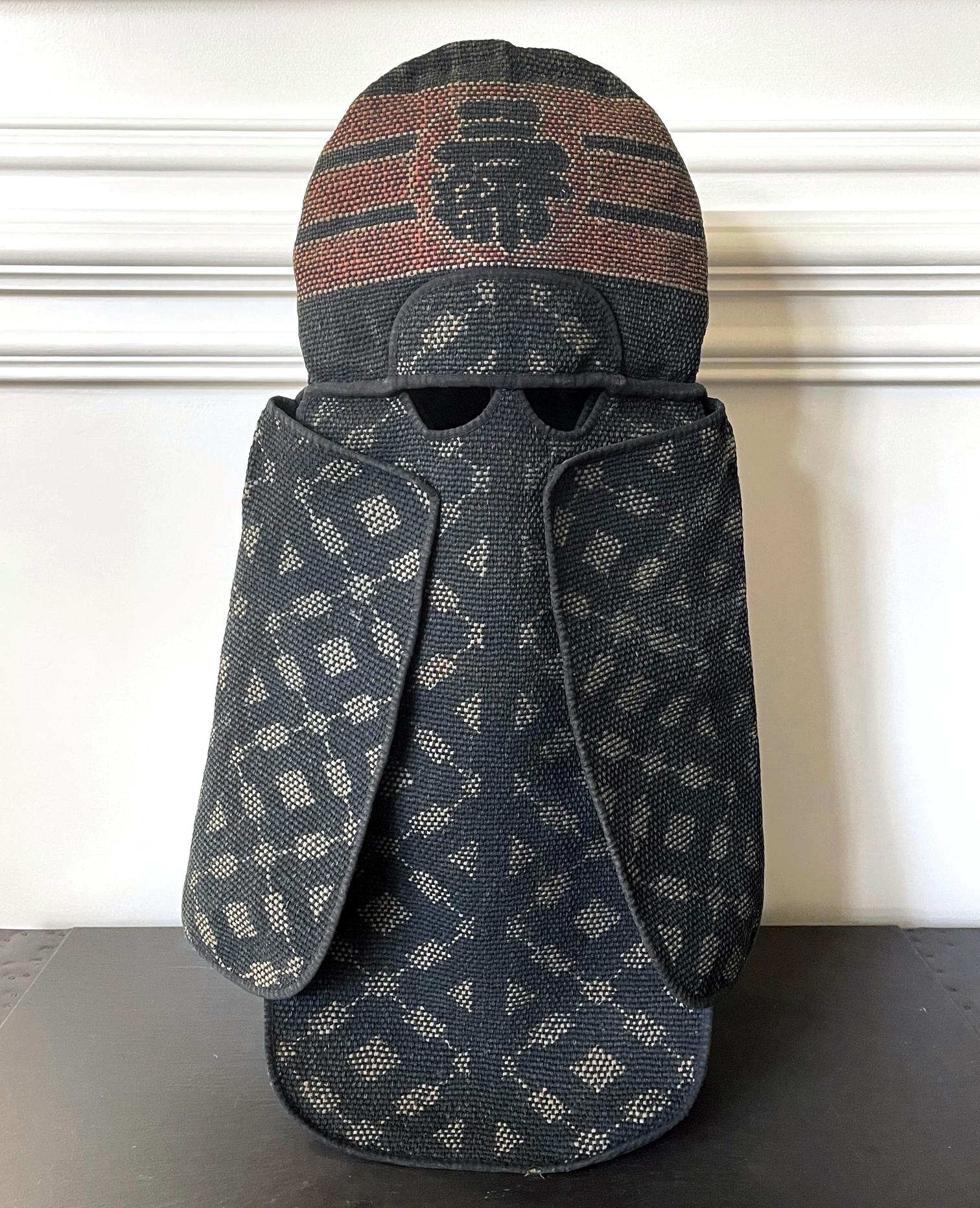 A well-preserved Japanese fireman's hood (known as hikeshi zukin in Japanese) circa 1900s, late Meiji period. Woven with thick cotton with sashiko (cotton thread quilting) and katazome (stencil resist dye), this is a piece of vernacular textile art