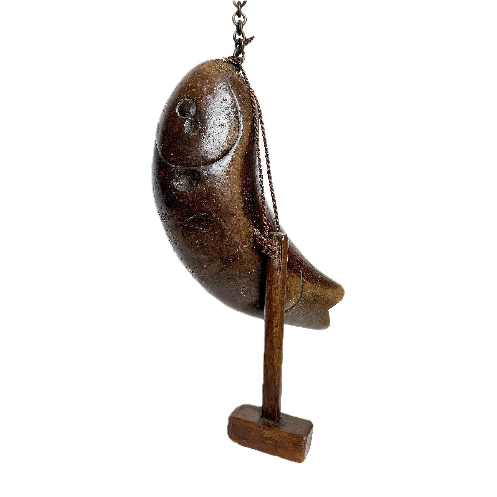 Japanese Monk Meditation Fish Gong, Edo Period (Zen fish shaped drum, Gyoban)

In the Zen Buddhist temples of Japan, suspended in front of the entrance to the refectory, you will notice an odd object, a wooden fish... This is actually a drum, called