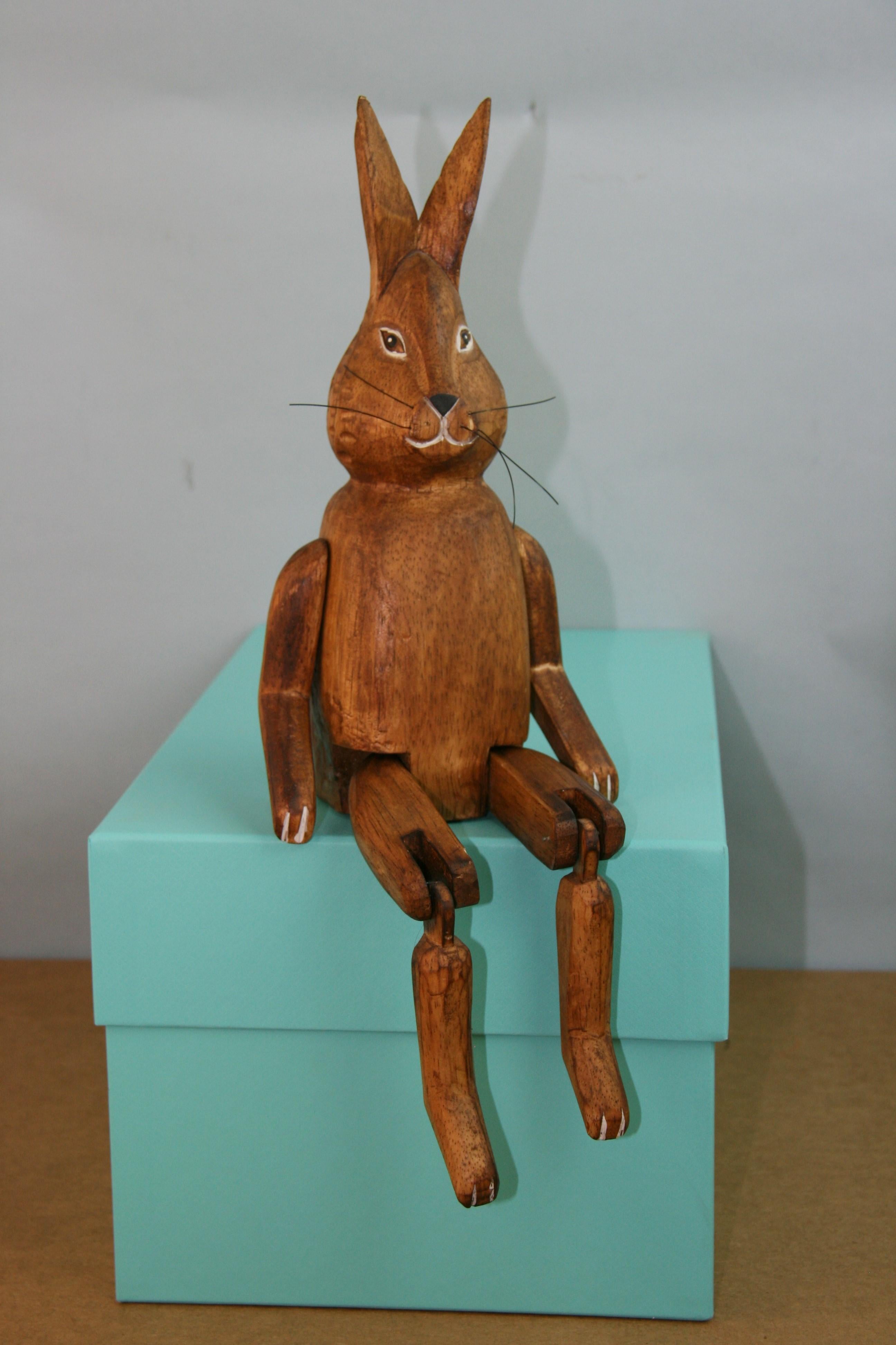 Japanese Folk Art articulating hand carved wood rabbit.
Made to sit on a shelf.
Movable arms and legs