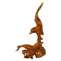 Scultura di delfino intagliata a mano con radici di albero dell'arte popolare giapponese