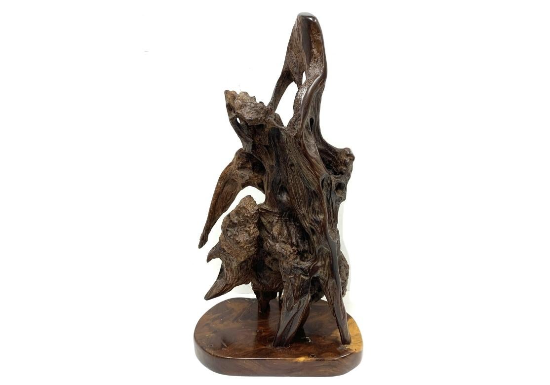 A dramatic and beautifully timeworn Japanese Wood Sculpture in vaguely anthropomorphic form balanced on five points and fashioned from a particularly dense and heavy wood.  A wonderfully contemplative piece that reveals many interesting facets when