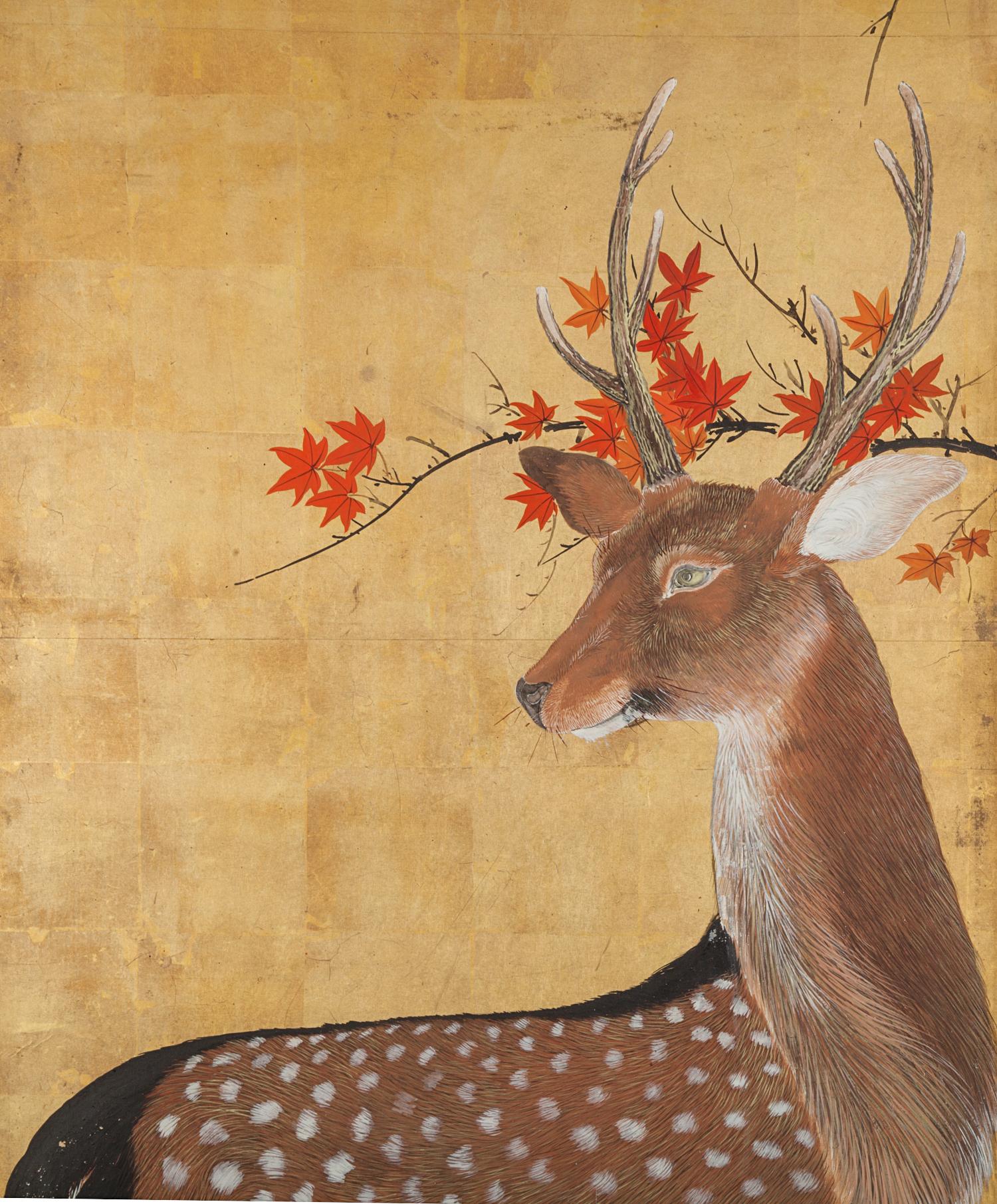 Japanese four panel screen: Buck and doe with autumn maple on gold. Late Meiji period (1868-1912) painting of an amorous pair of deer in autumn. Painted in mineral pigments on gold with a silk brocade border.
 