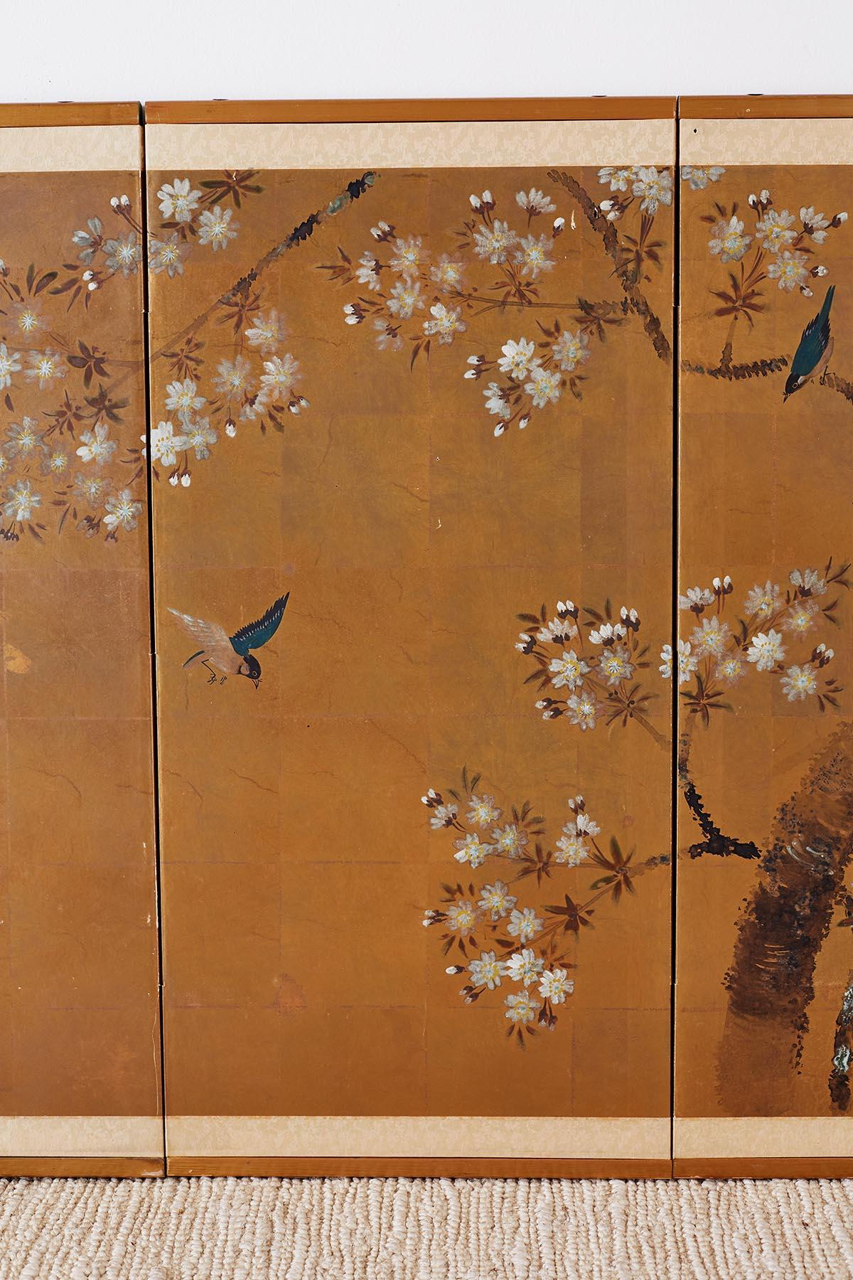 Gilt Japanese Four-Panel Screen of Birds in Prunus