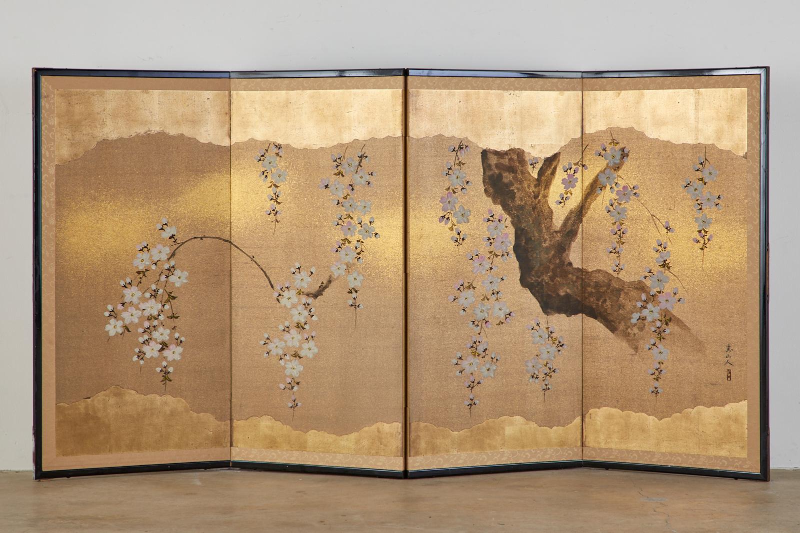 Gorgeous Japanese four panel Showa period screen depicting flowering cherry tree blossoms. Made in the Nihonga School style with ink and color pigments on paper with dramatic gold leaf and gold flecks. Signed by artist Hisayama-hito with a seal on
