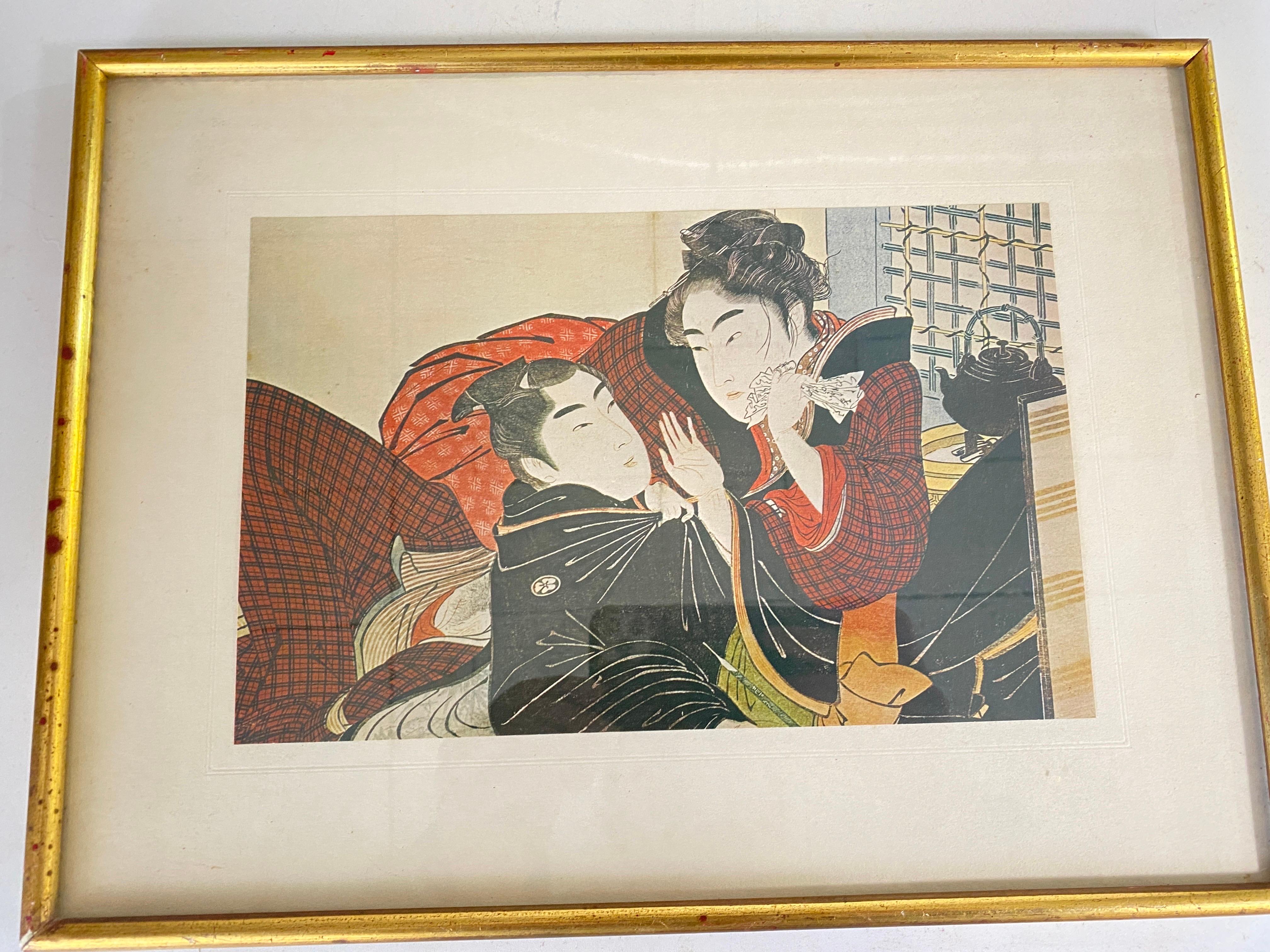 20ième siècle Reproduction d'estampes japonaises encadrées 20ème siècle Cadre doré 20ème siècle Lot de 2 en vente