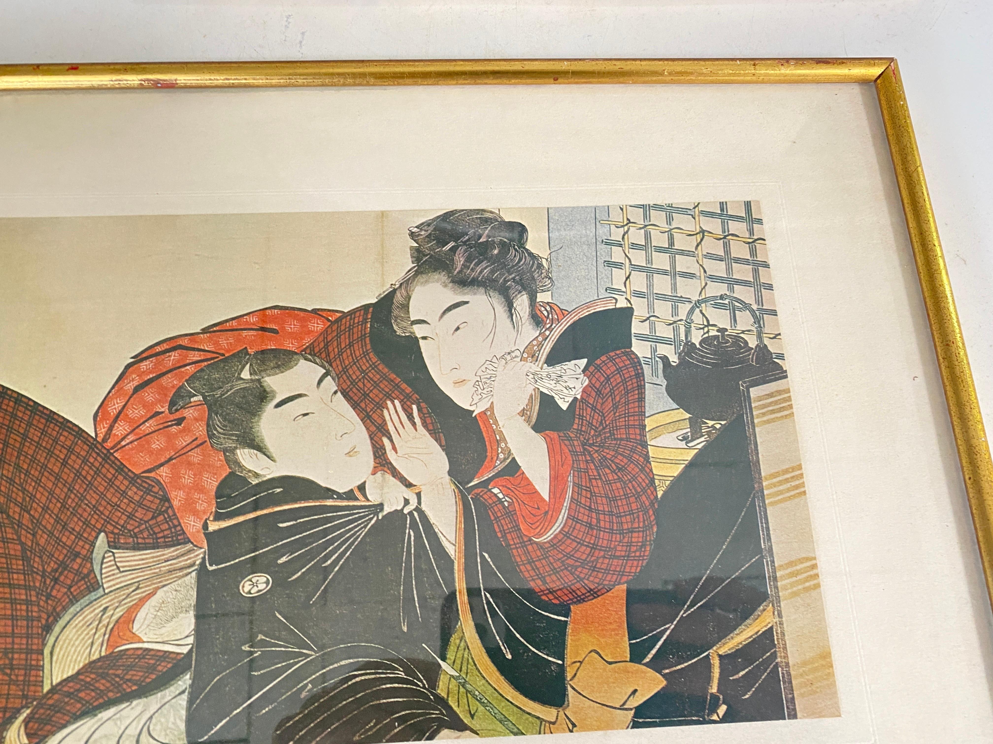 Papier Reproduction d'estampes japonaises encadrées 20ème siècle Cadre doré 20ème siècle Lot de 2 en vente
