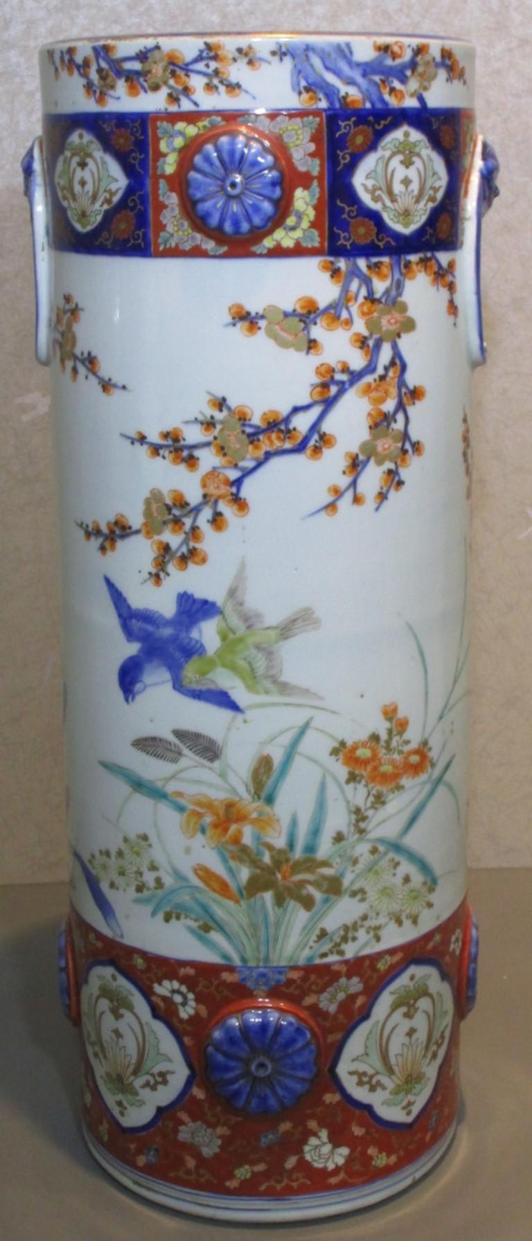 Exceptional Japanese tall Fukagawa Meiji period Imari porcelain vase in iron-red, cobalt blue and green on a stunningly shaped porcelain body. Fukagawa Eizaemon started the Koransha (Scented Orchid) company in 1875 and after his death in 1889, his
