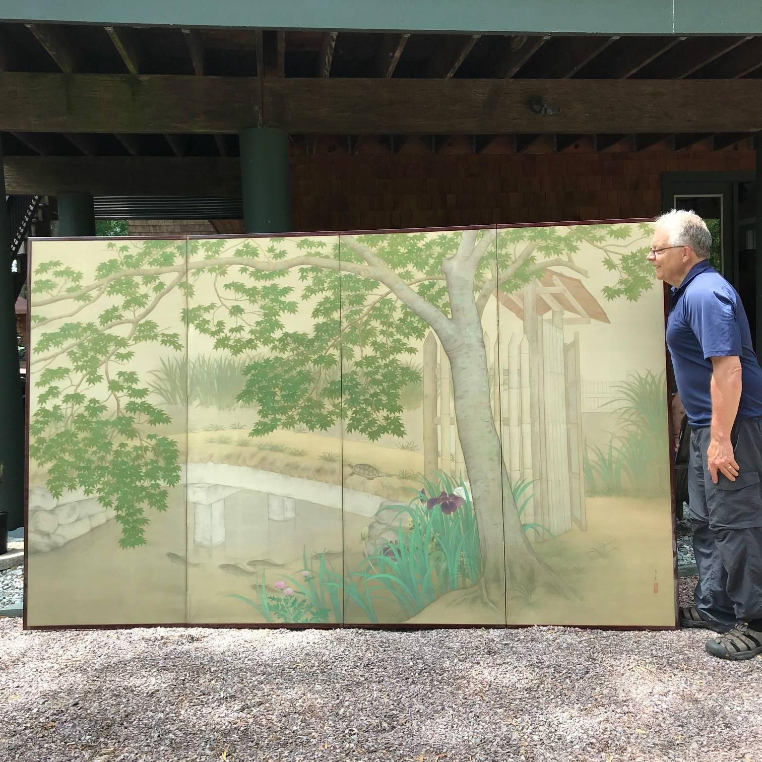 Unusual Japanese Four Panel Garden Screen, Mint Condition 

Japan, a superb four-panel silk screen byobu depicting a panoramic garden replete with koi, turtles, Iris nestled near a walking bridge and wooden roofed shelter. This attractive screen