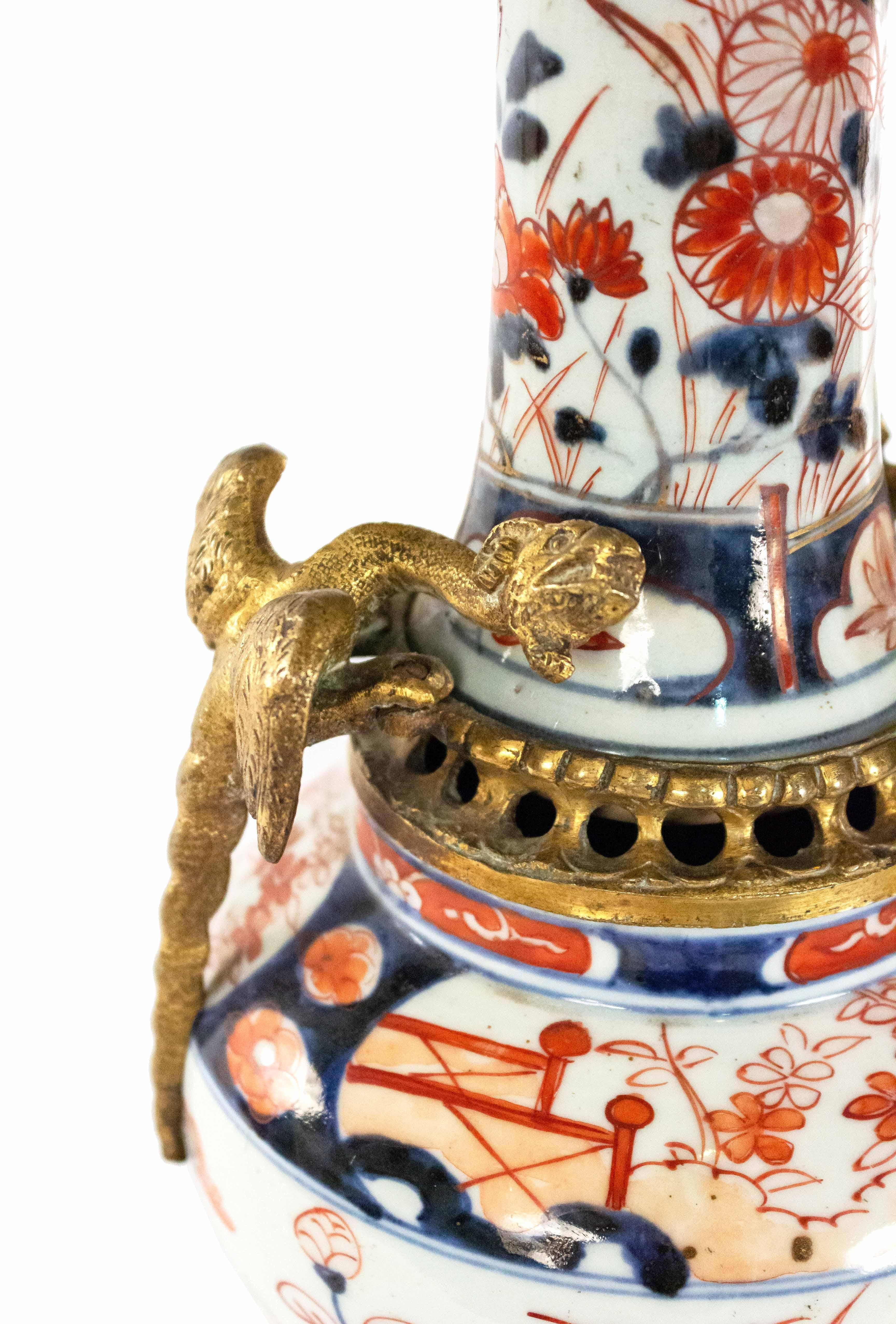 Japanese Gilt Bronze Mounted Imari Porcelain Vases In Good Condition In New York, NY