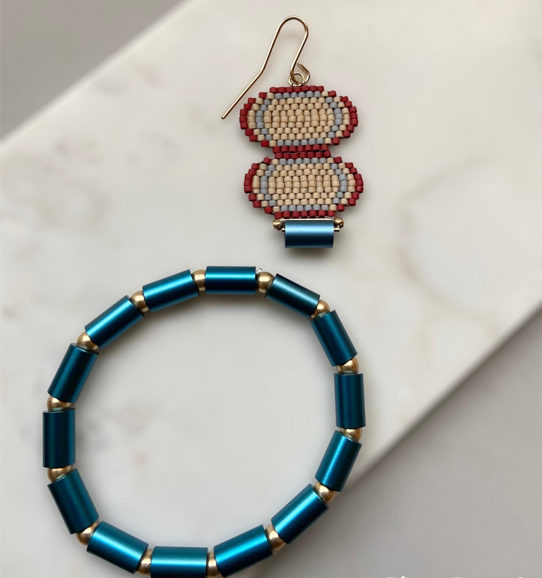 Premium Japanese Miyuki glass beads are hand woven in oval shapes in a stage process then woven again to complete these color popping light-weight earrings.  Anodized aluminum and 14K gold filled beads are used for an interesting modern feel.  The