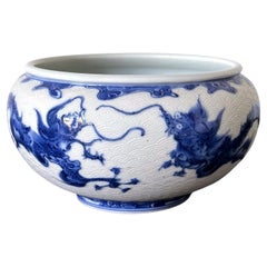 Japanese Glazed and Caved Ceramic Dragon Bowl by Makuzu Kozan