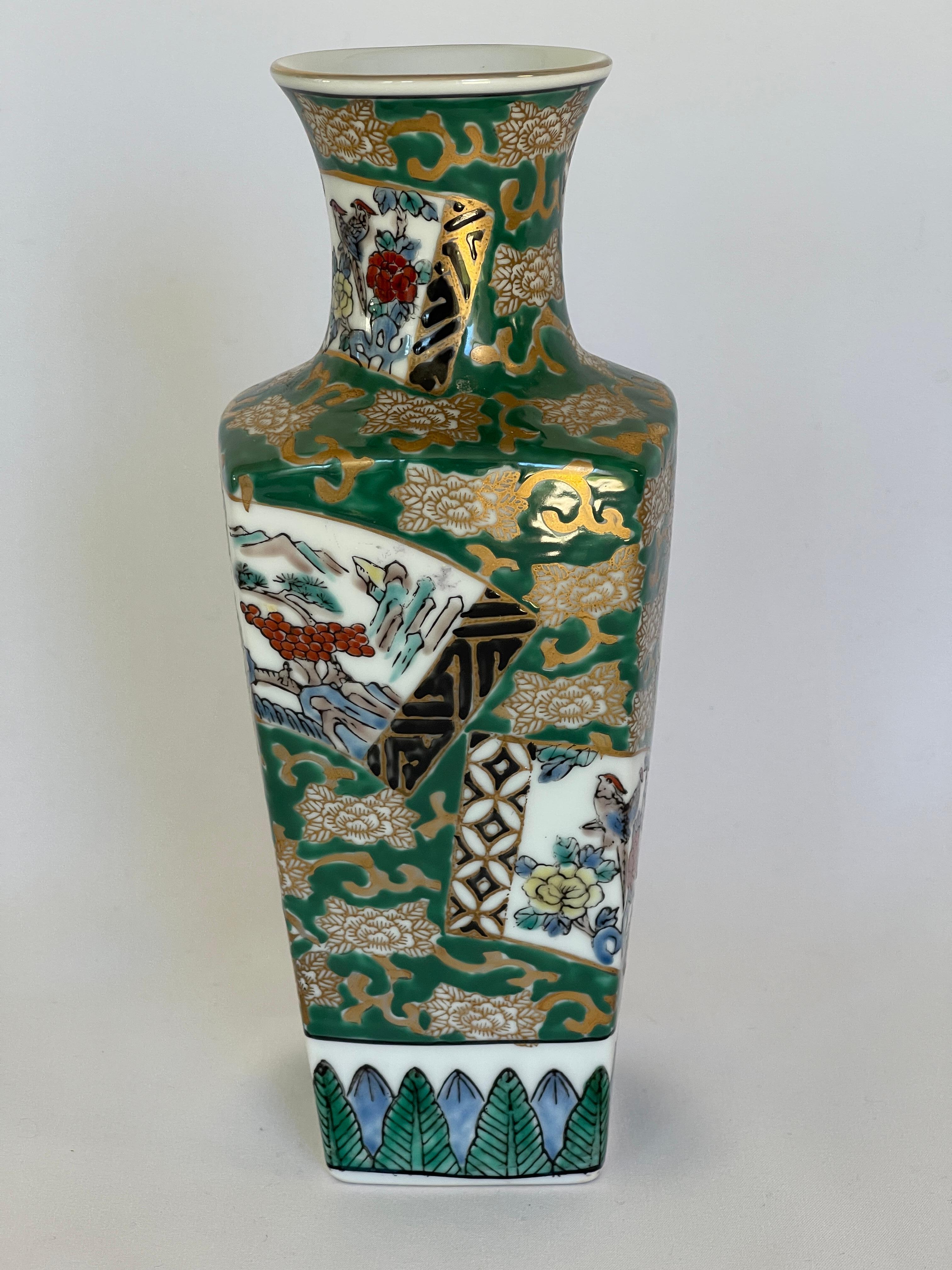 Graceful hand decorated Japanese vase with traditional motifs and gold rimmed top., c. 1960's. Signed on bottom, Gold Imari.