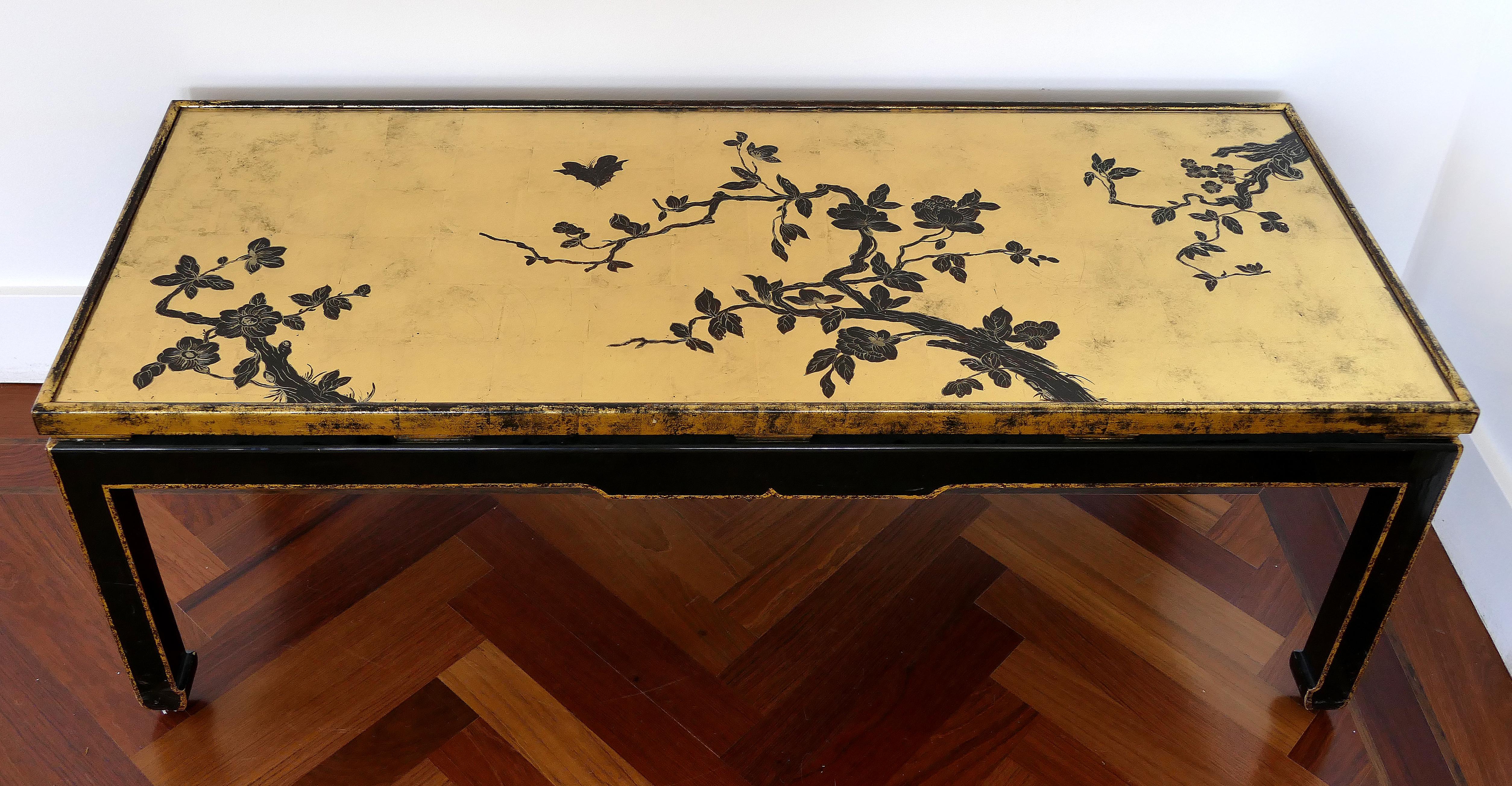 Mid-century Japanese gold leaf cherry blossom coffee table with inset glass

Offered for sale is a mid-century lacquered and gilt-wood coffee table depicting Japanese cherry blossoms. This beautifully crafted table has an inset glass that protects