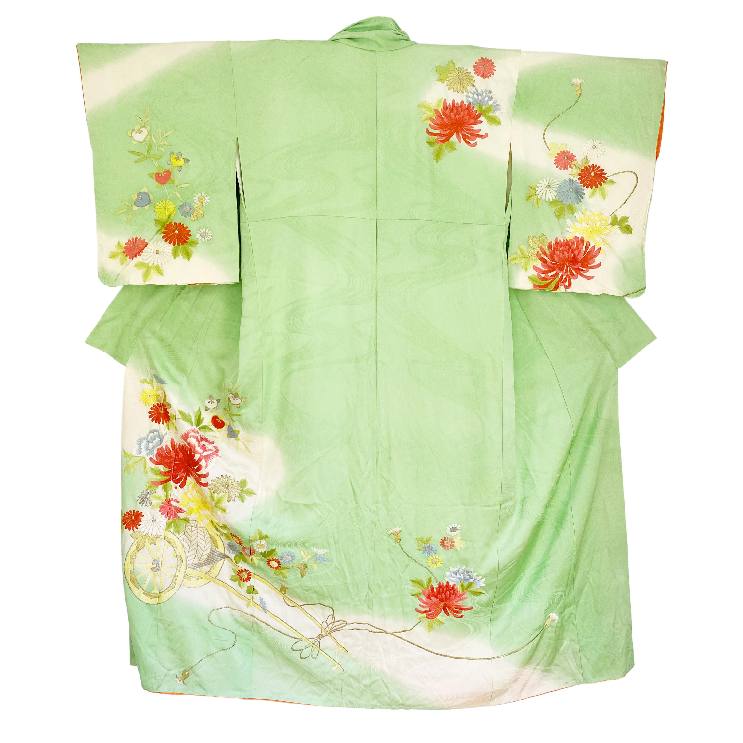 Gorgeous fresh green wave silk jacquard. 
Gold thread embroidered caleche and flowers. 
Subtly dramatic ombré lining.
Circa: 1890  MEIJI
Place of Origin: Japan
Material: Silk
Condition: Good - some age stains.  
Pale-ground printed all silk kimono