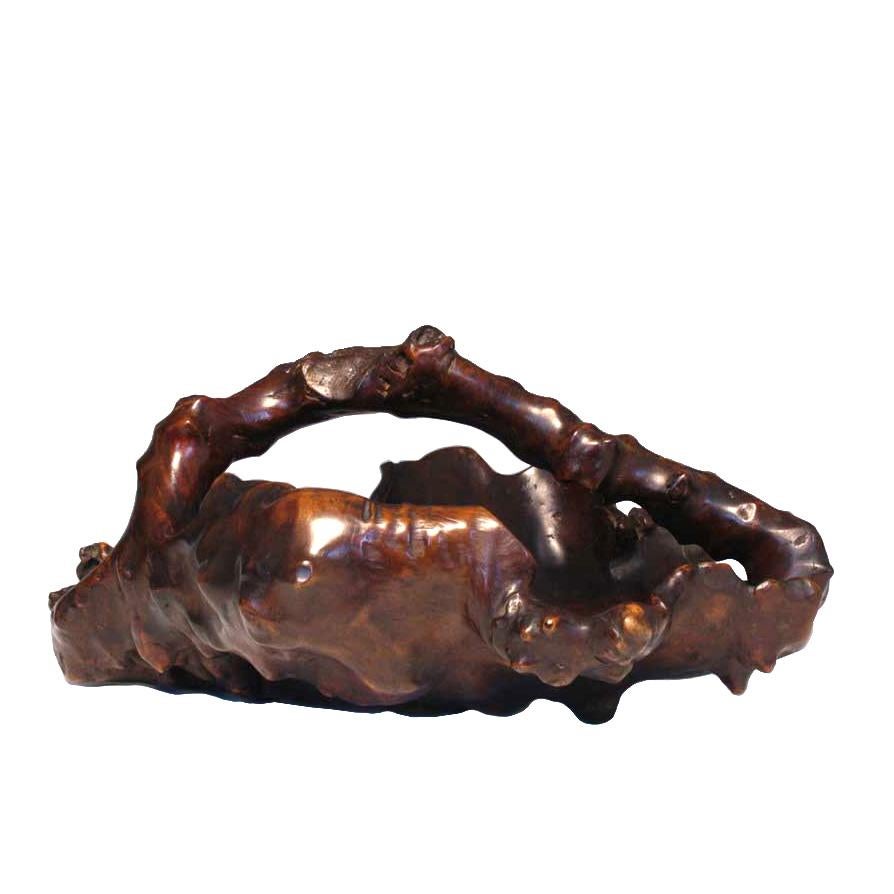 Japanese solid wood fruit and flower display basket, carved from one piece of burl wood in an oval shape with single large overhead handle in a natural form with nodes, grottos and protrusions, finished in a dark brown translucent finish.
Minor