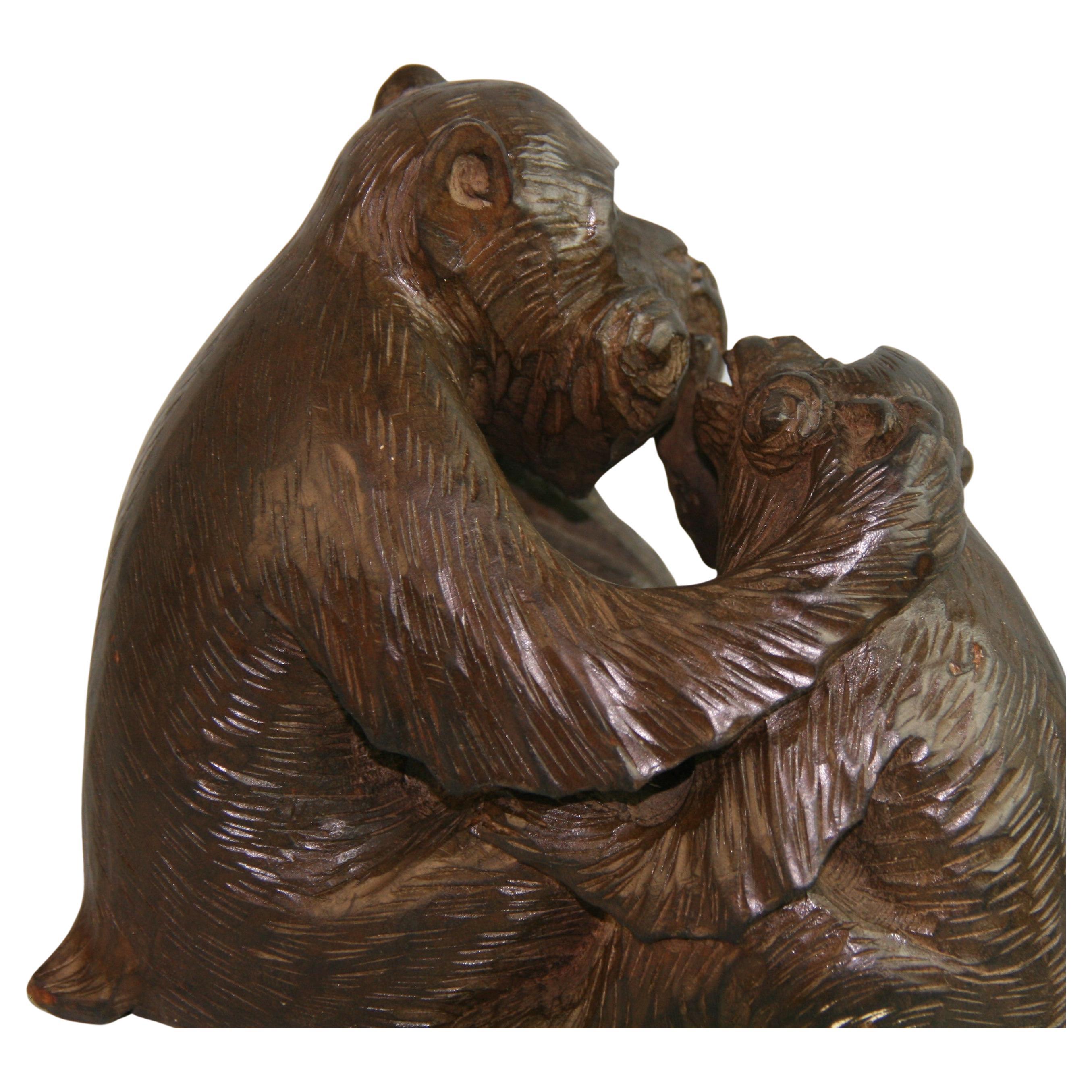 1276 Sculpture japonaise de famille de singes en bois dur, sculptée à la main.
Des détails fins.