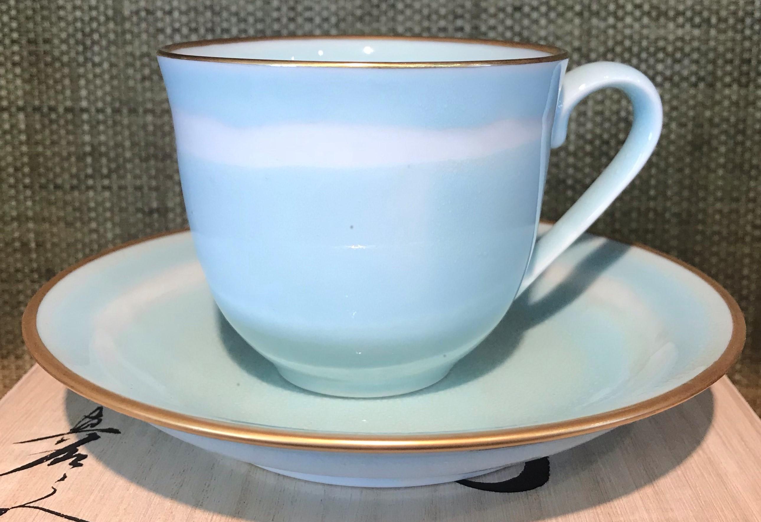 Exceptional Japanese contemporary gilded porcelain cup and saucer, hand-glazed in stunning signature blue on a beautifully shaped body, a signed work from one of the most striking collections by highly acclaimed award-winning master porcelain artist