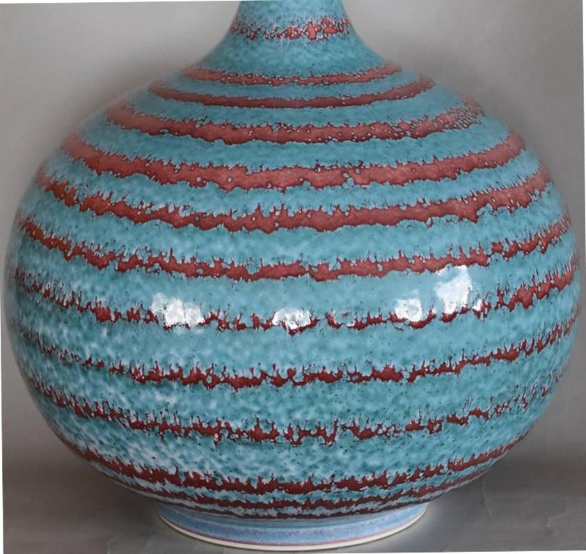 Extraordinary Japanese contemporary hand-glazed decorative porcelain vase in vivid turquoise and wine red, a signed masterpiece by widely respected award-winning master porcelain artist in 