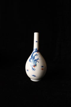 Japanese Hand-Painted Porcelain Sake Bottle with Dragon Motif. Imari style
