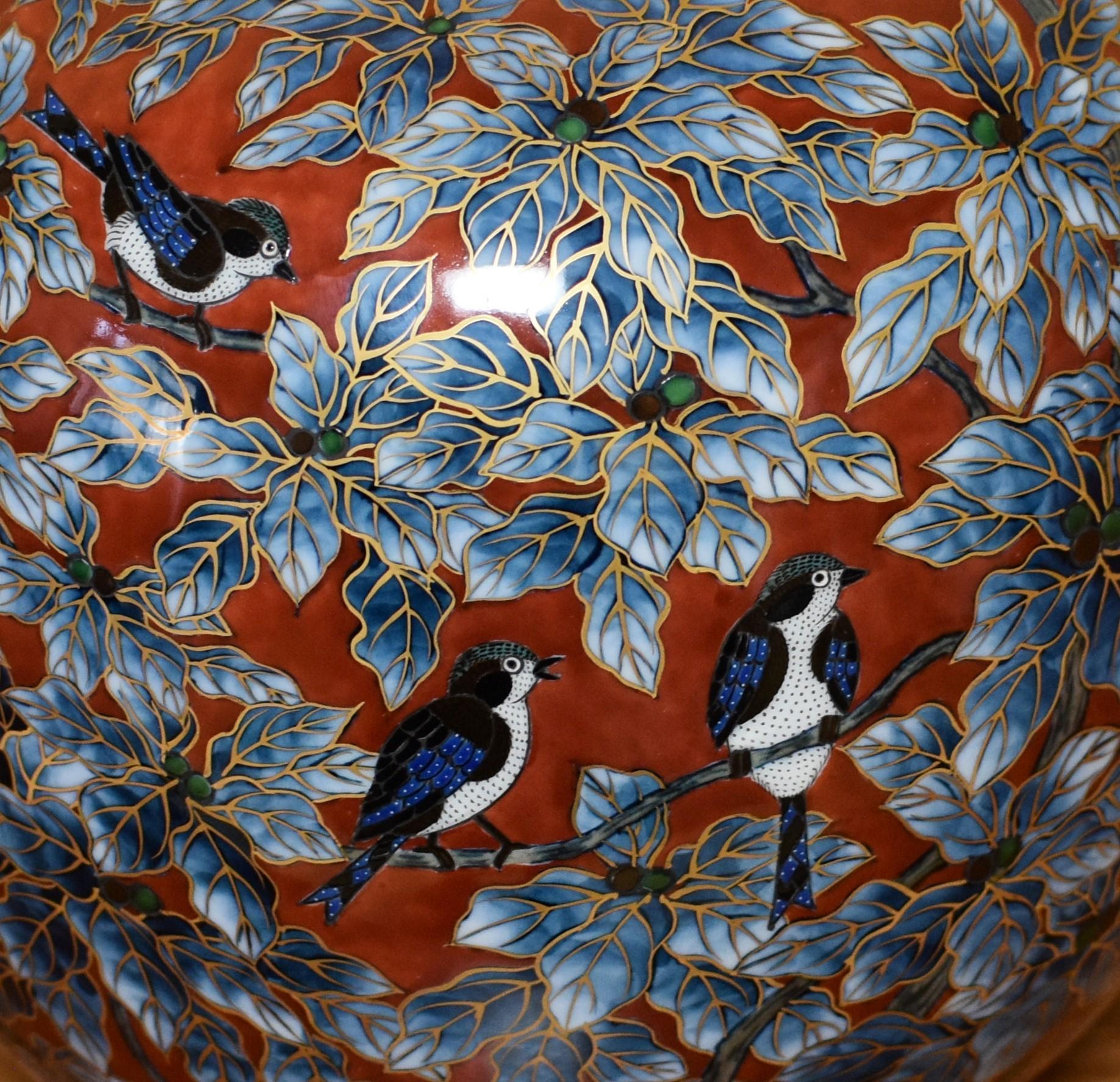 Extraordinary Japanese contemporary decorative porcelain vase, painstakingly intricately gilded and hand painted in stunning blue and red on a beautiful globular body, a signed masterpiece by second-generation master porcelain artist of the