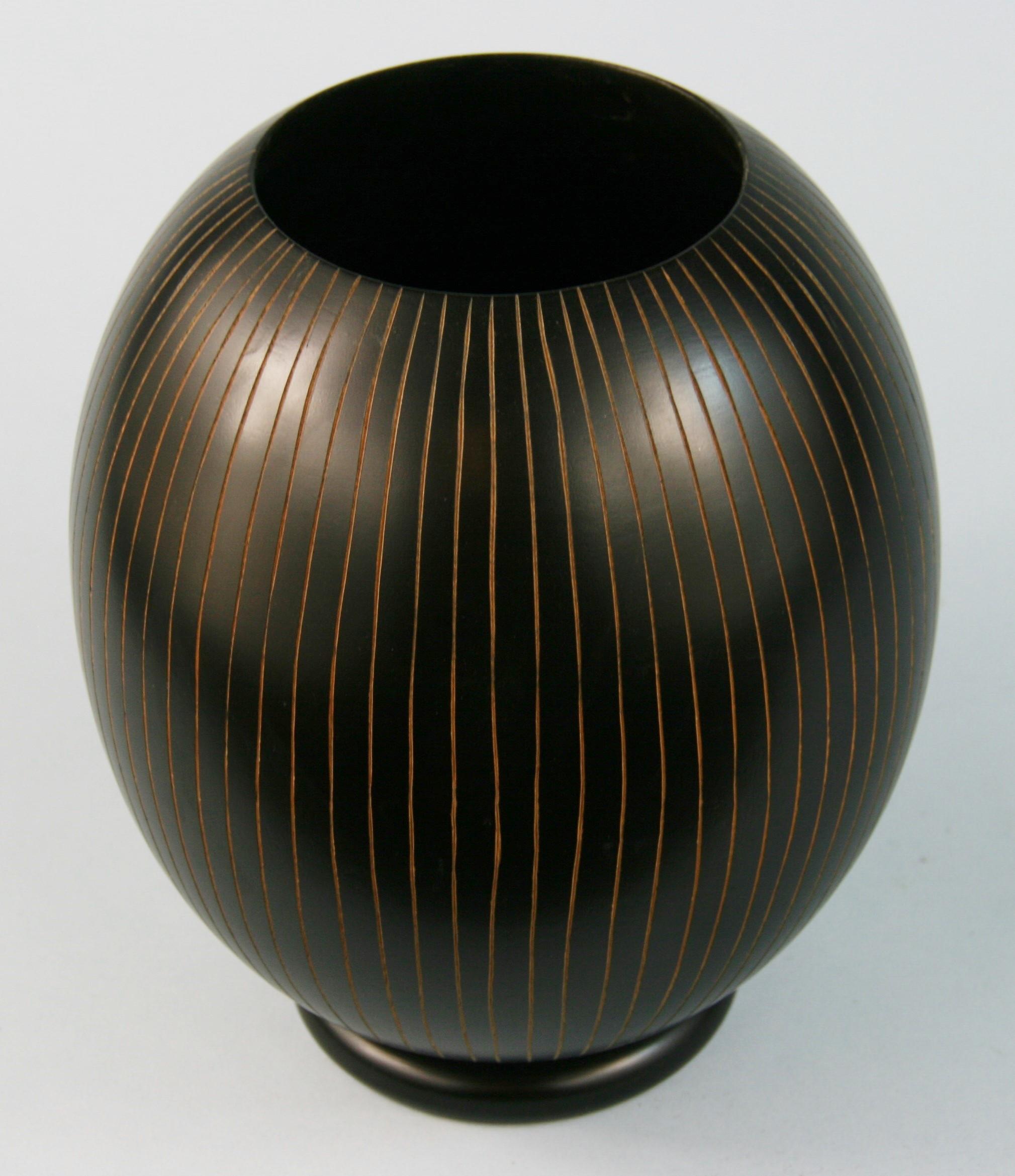 3-617 Japanese hand turned wood vase with concentric groves.