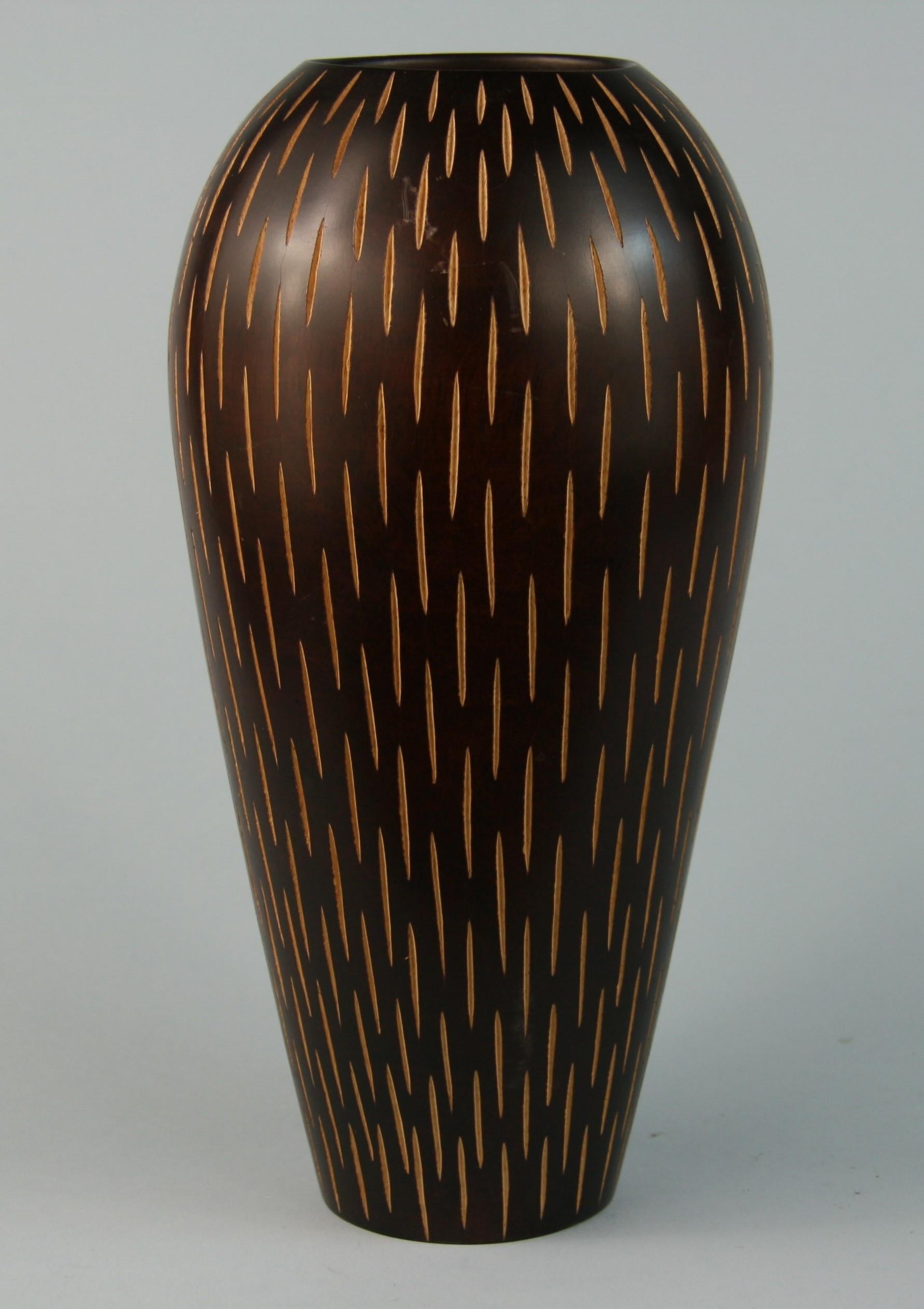 3-616 Japanese hand turned wood vase with vertical slits.