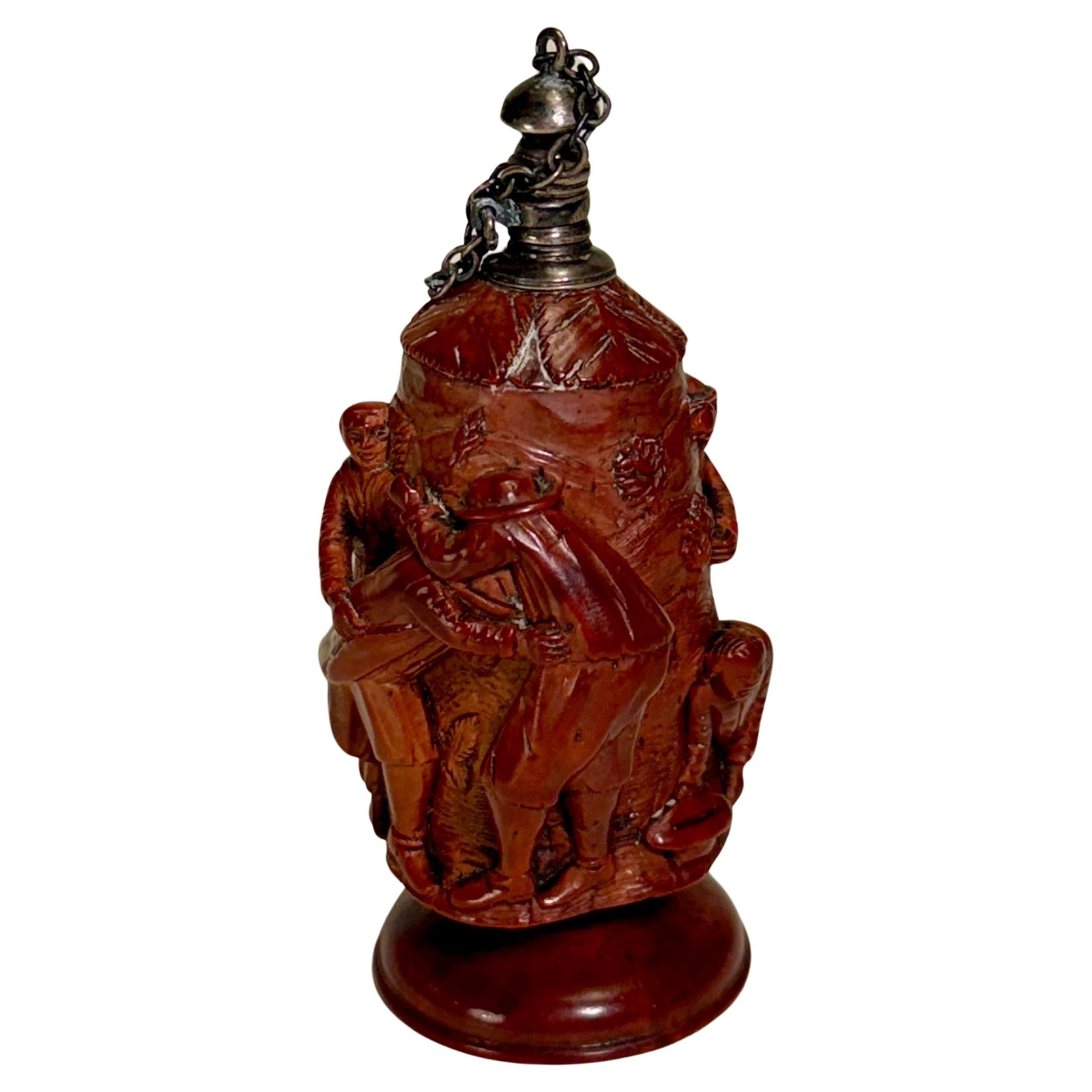 European hand carved boxwood snuff tobacco box or flacon with silver screw cap lid. This impressive snuff box depicts a scene with people as well as a large tree. Certainly a fantastic piece for the collector of these impressive shakers.