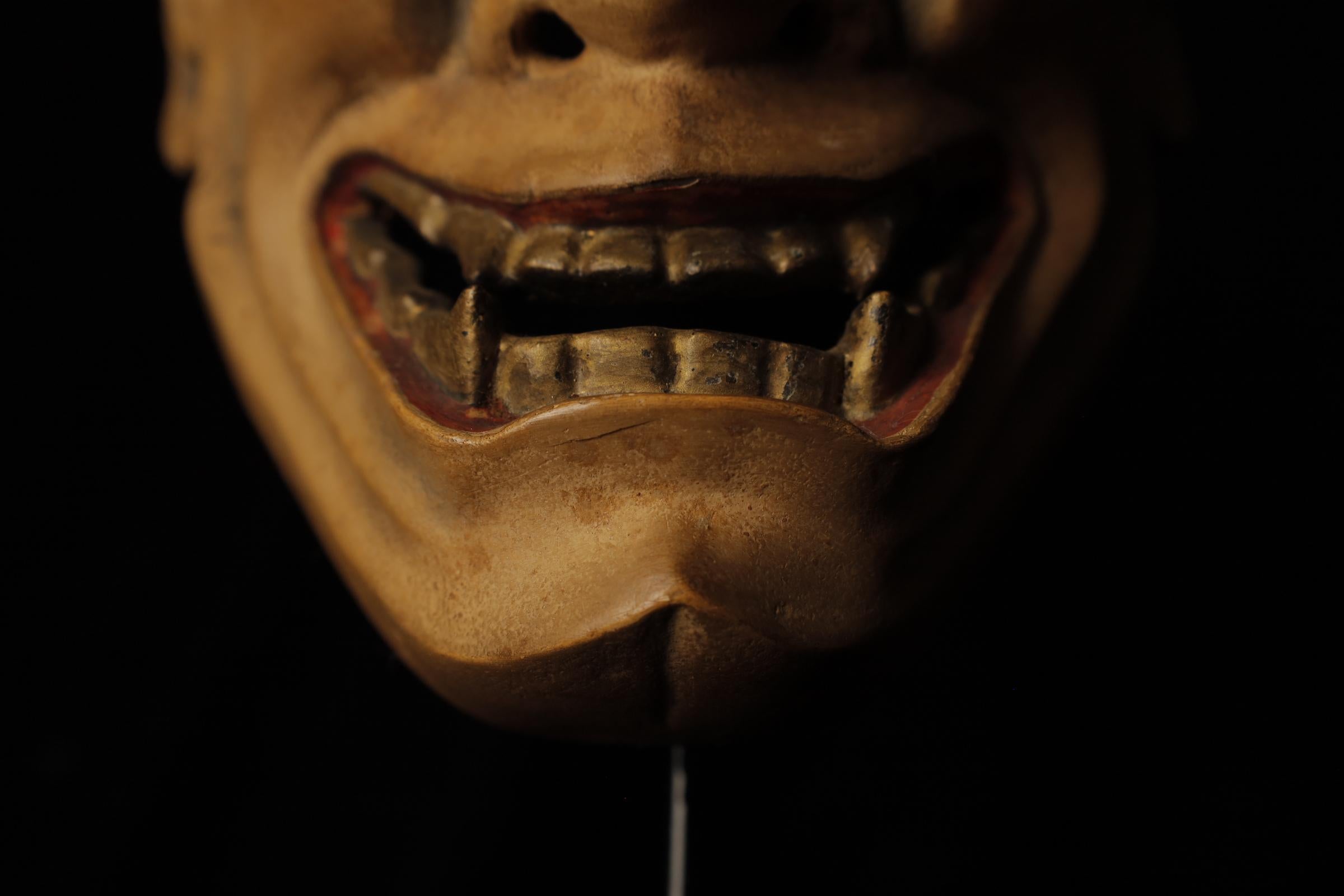 Hannya (般若)  Noh Mask attributed to Takada Fuki (高田 冨季, 1935–2008)

Mask: Hannya (般若)
SKU: TBA09
Size: W: 15.5cm, H: 20.5 cm (W/horns 24cm)

The Hannya mask represents a female demon who has been consumed by jealousy, rage, and sorrow. The horns on