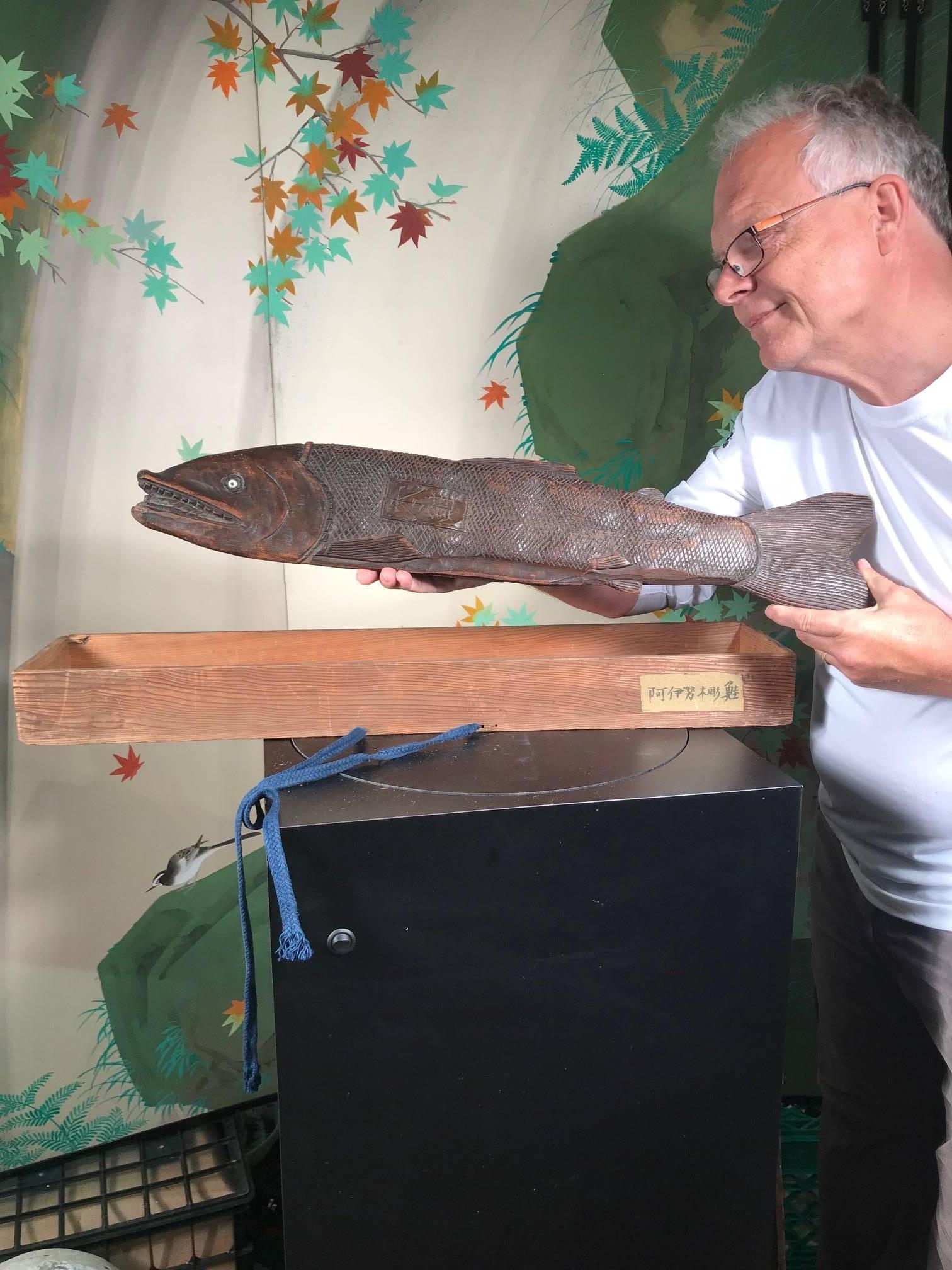 Own a rare one-of-a-kind Divine Fish.

A large-scale fine old Japanese hand-carved wooden salmon fish- important symbolic work of art suggesting prosperity and good fortune in the Japanese ainu people's culture from Hokkaido Island. This big fish is