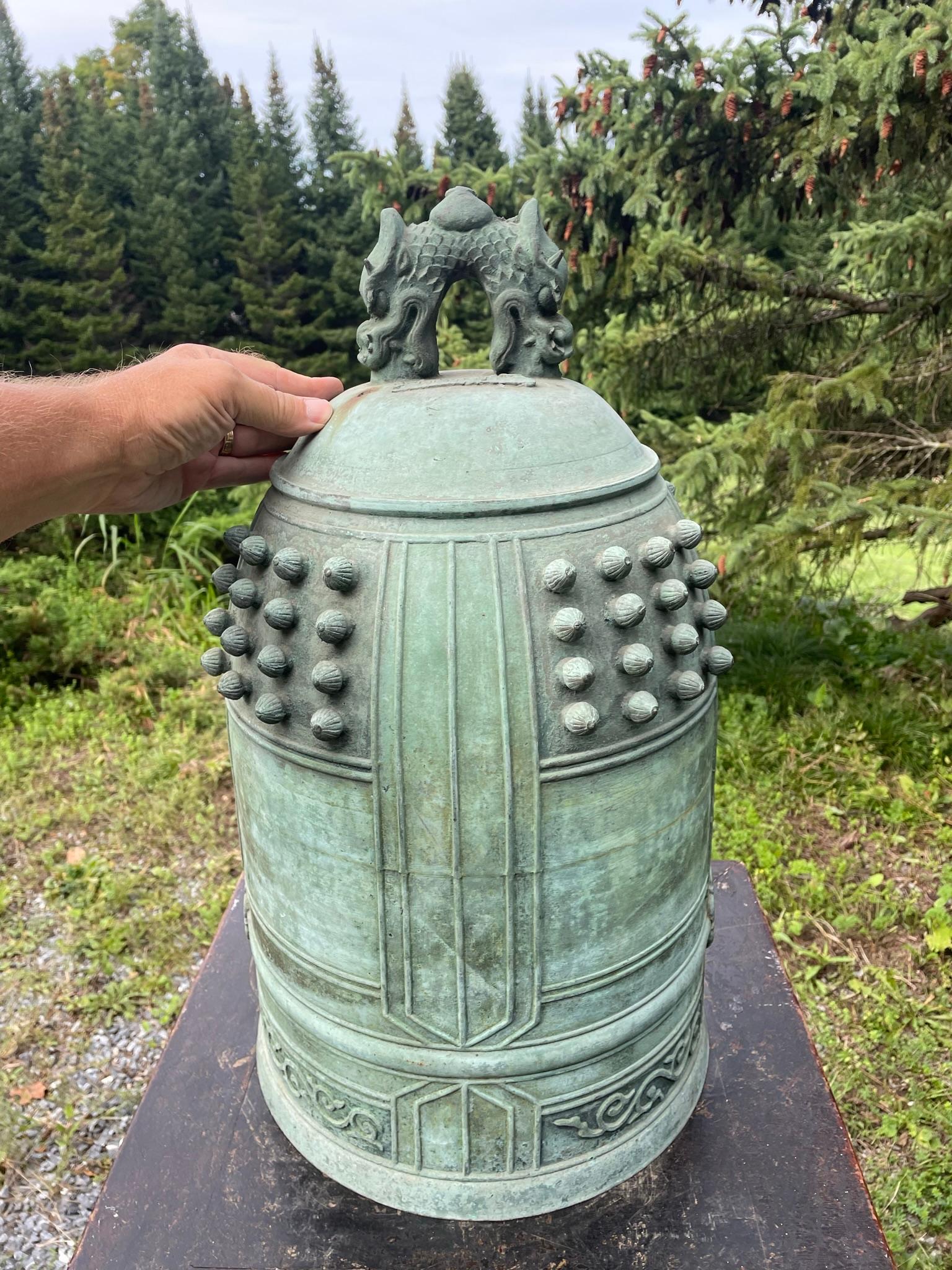 For your special garden setting or indoor display space.

Huge Hand Cast Blue Patina Bronze Bell With Multiple Signatures, Bold pleasing sound

Beautiful deep resonating ring tones await the new owner of this huge one-of-a-kind antique bronze bell