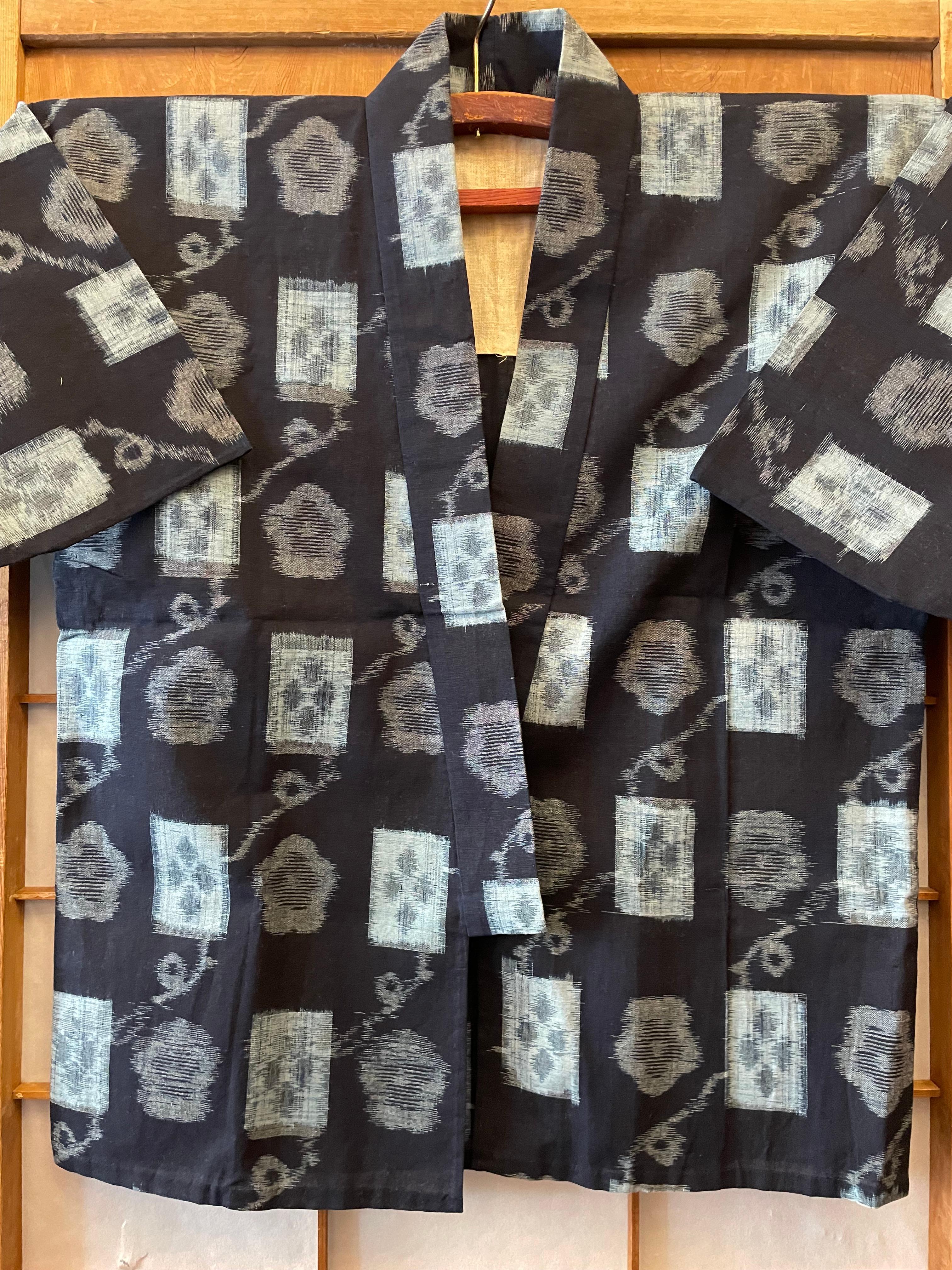 This is a jacket made in Japan called kasuri. This kasuri jacket was made around 1970s.
It was used to wear by some peasants to work. This is made with cotton Ikat.

Dimensions:
Height of Kasuri 80 cm
Wide of Kasuri 122 cm
Height of  sleeve 27