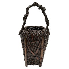 Japanese Ikebana flower basket made of bamboo with its Knotty Wood handle