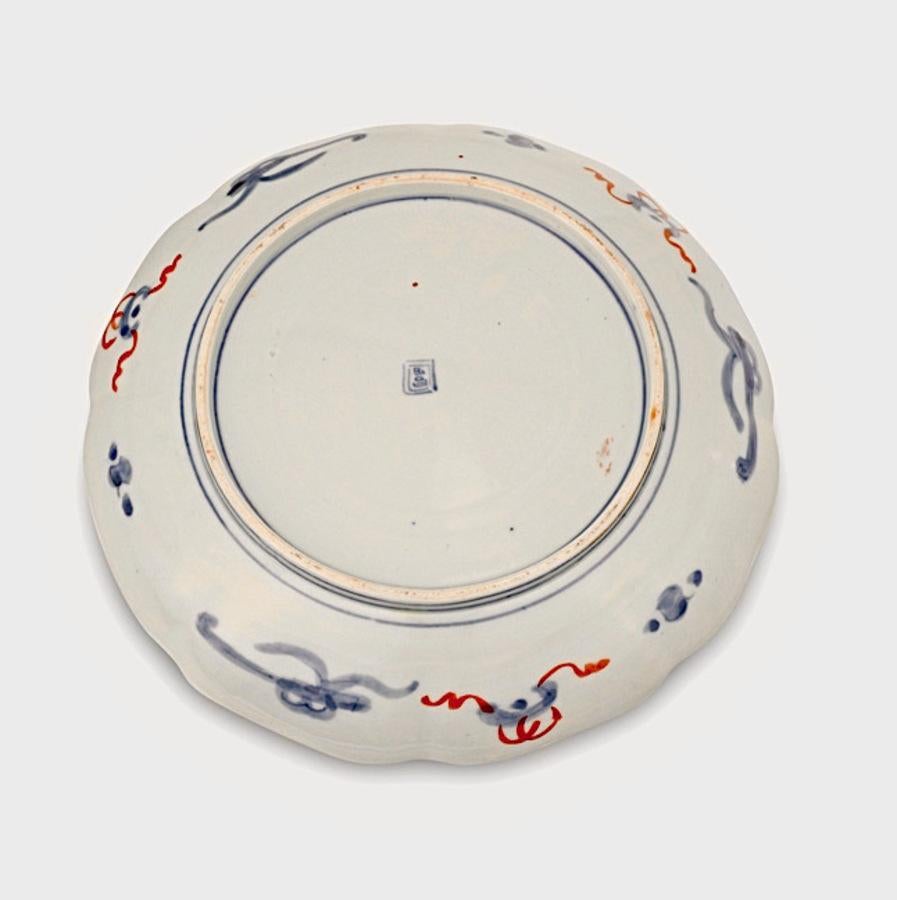 This is a very good set of 10 Japanese Imari hand painted dinner plates that date to the Meiji period. All 10 plates are in very good original condition, showing only hints of use. These plates would add excitement to any table setting--especially