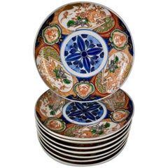 Japanese Imari Enameled Porcelain Blue Medallion Plates, Set of Eight