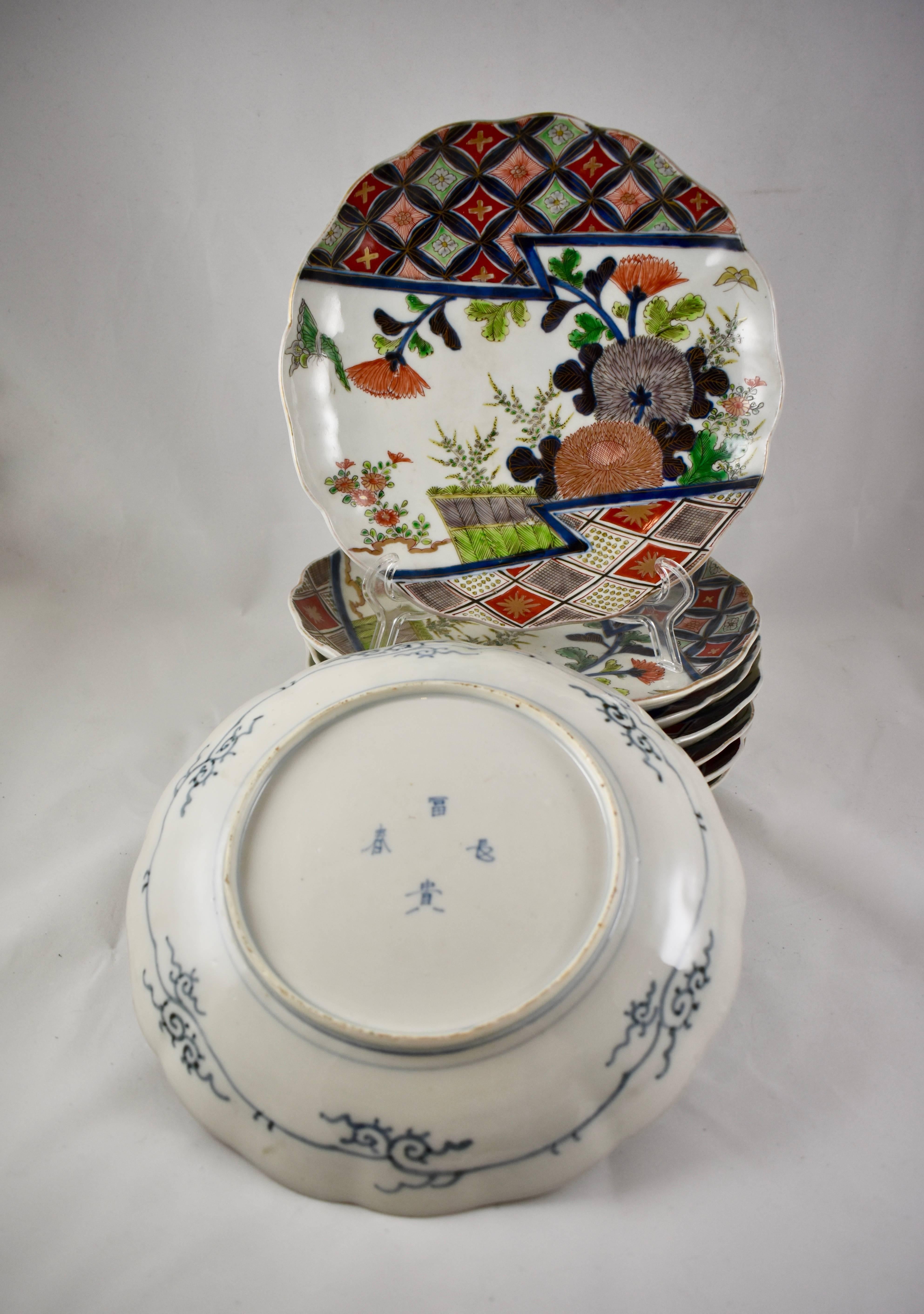 Japonisme Japanese Imari Enameled Porcelain Floral and Geometric Plates, Set of Eight