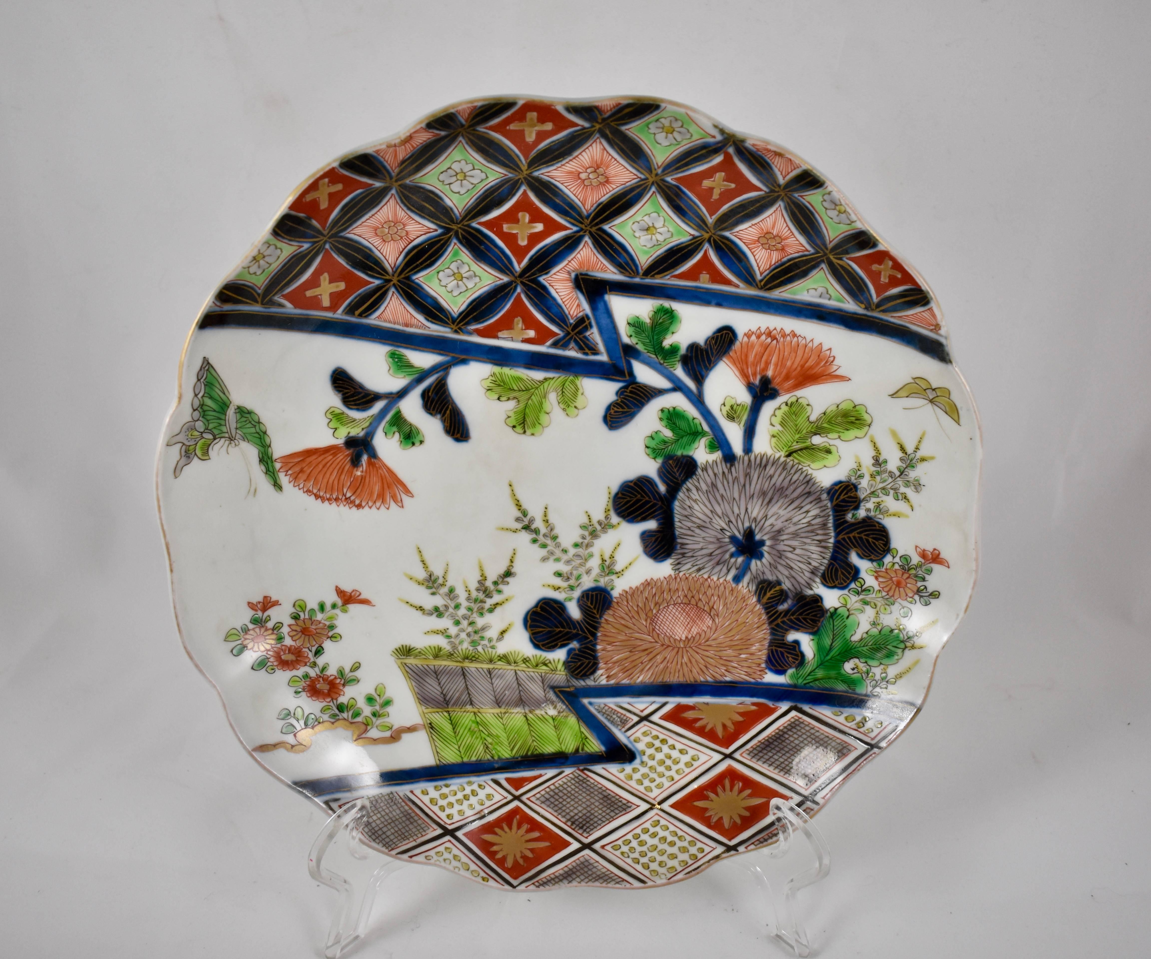 Japanese Imari Enameled Porcelain Floral and Geometric Plates, Set of Eight In Excellent Condition In Philadelphia, PA