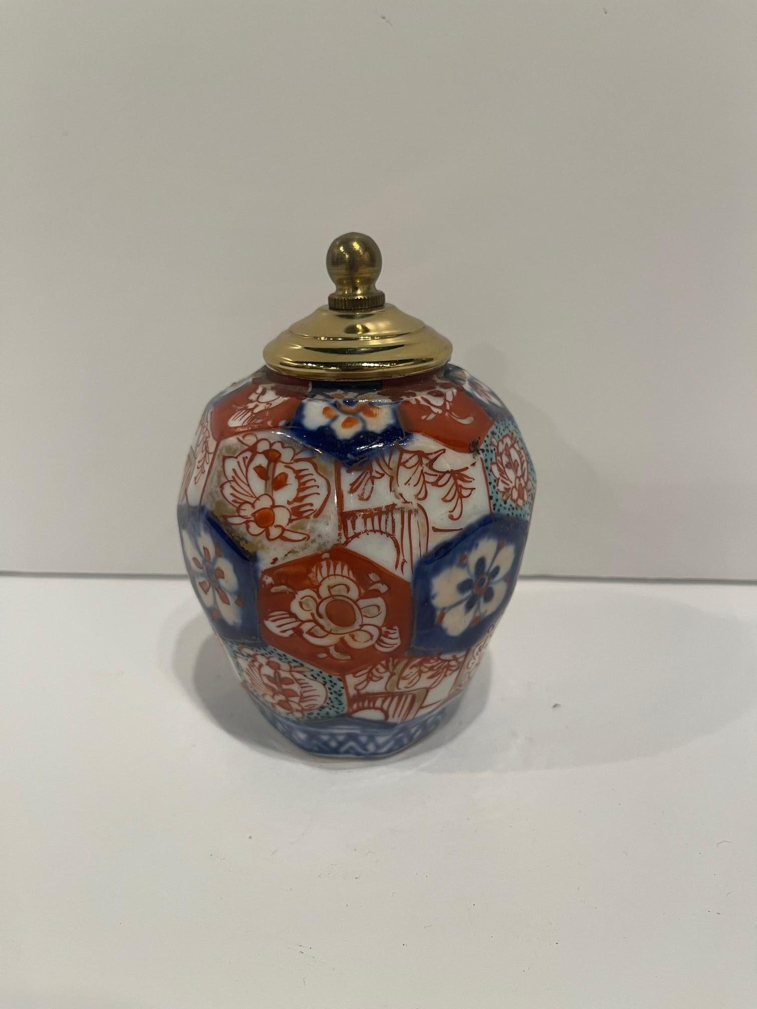 Porcelain Japanese Imari Flat Paneled Vase with a Brass Top, 19th Century For Sale