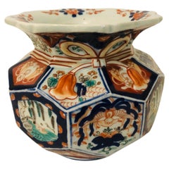 Japanese Imari Octagonal Vase, Each Side is Painted With a Different Painting