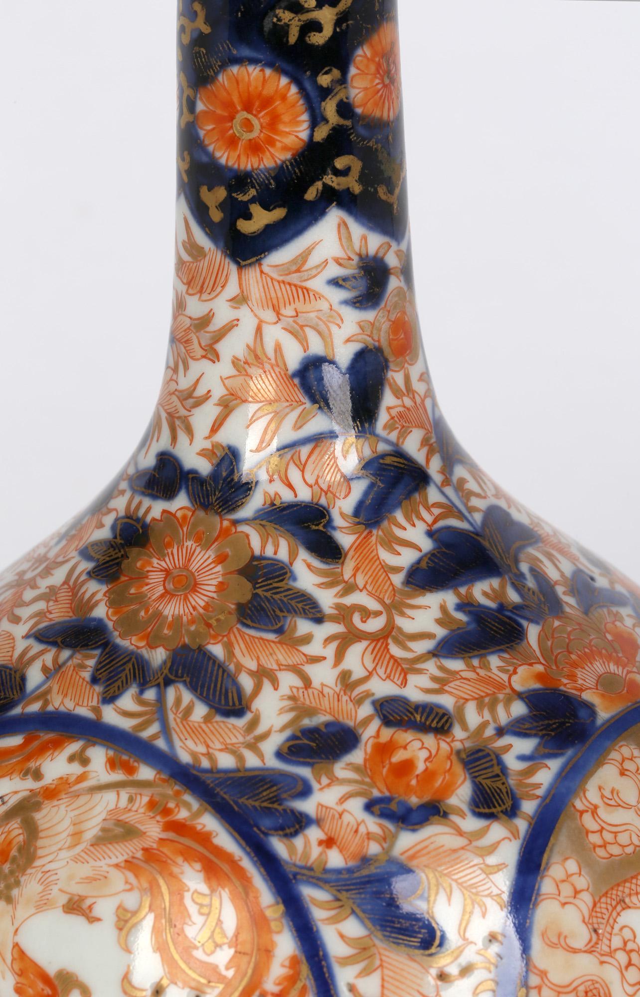 Gilt Japanese Imari Porcelain Bottle Vase with Dragons and Ho Ho Birds