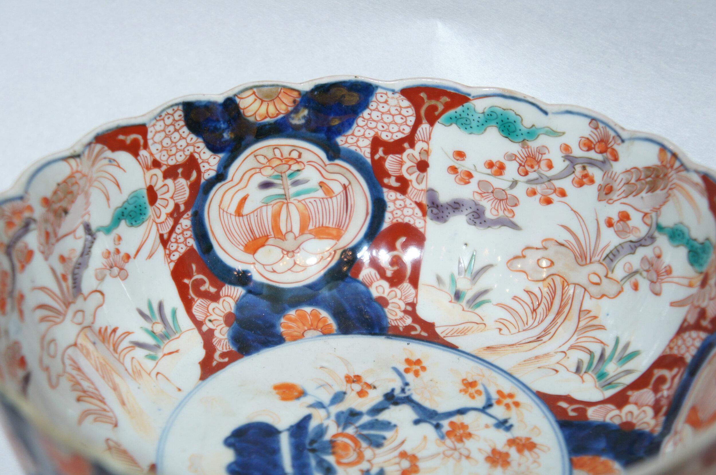 This serving bowl is made with porcelain and it was made in Japan around 1900s in Meiji era.
It is all hand painted. It was made in south of Japan with Imari style (Imari ware).

Dimensions:
21 x 21 x H9 cm

Imari ware is a Western term for a