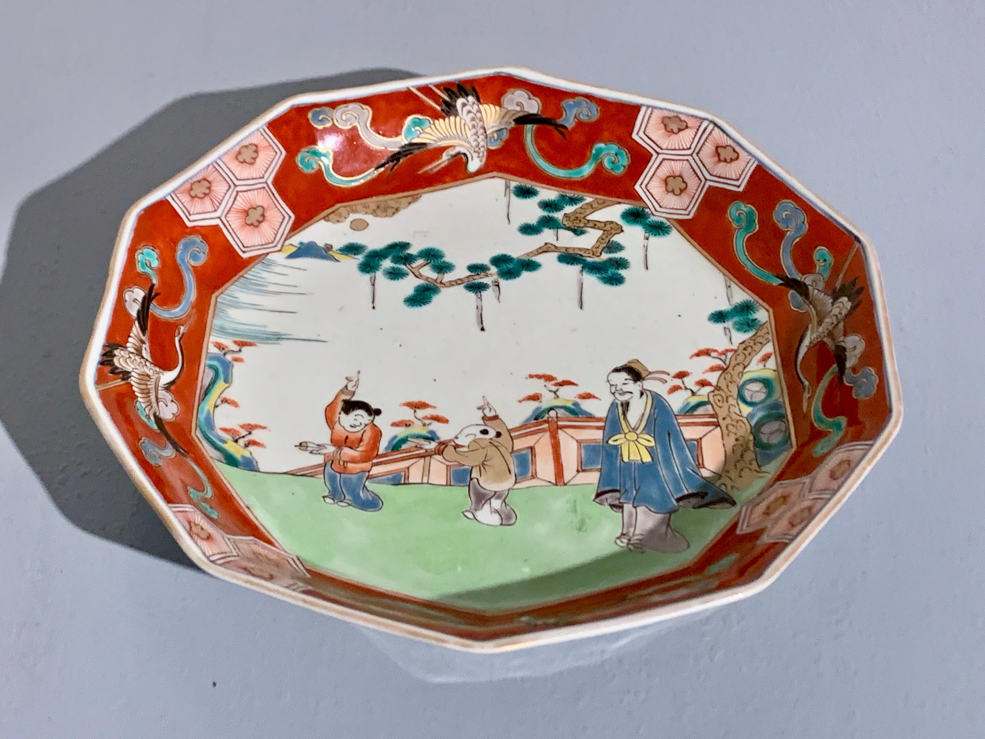 An unusual Japanese Imari porcelain decagonal (ten sided) dish with underglaze blue and overglaze enamels, Edo to Meiji Period, mid 19th century, Japan.

The ten sided dish features a charming Chinese inspired scene to the interior with a Taoist