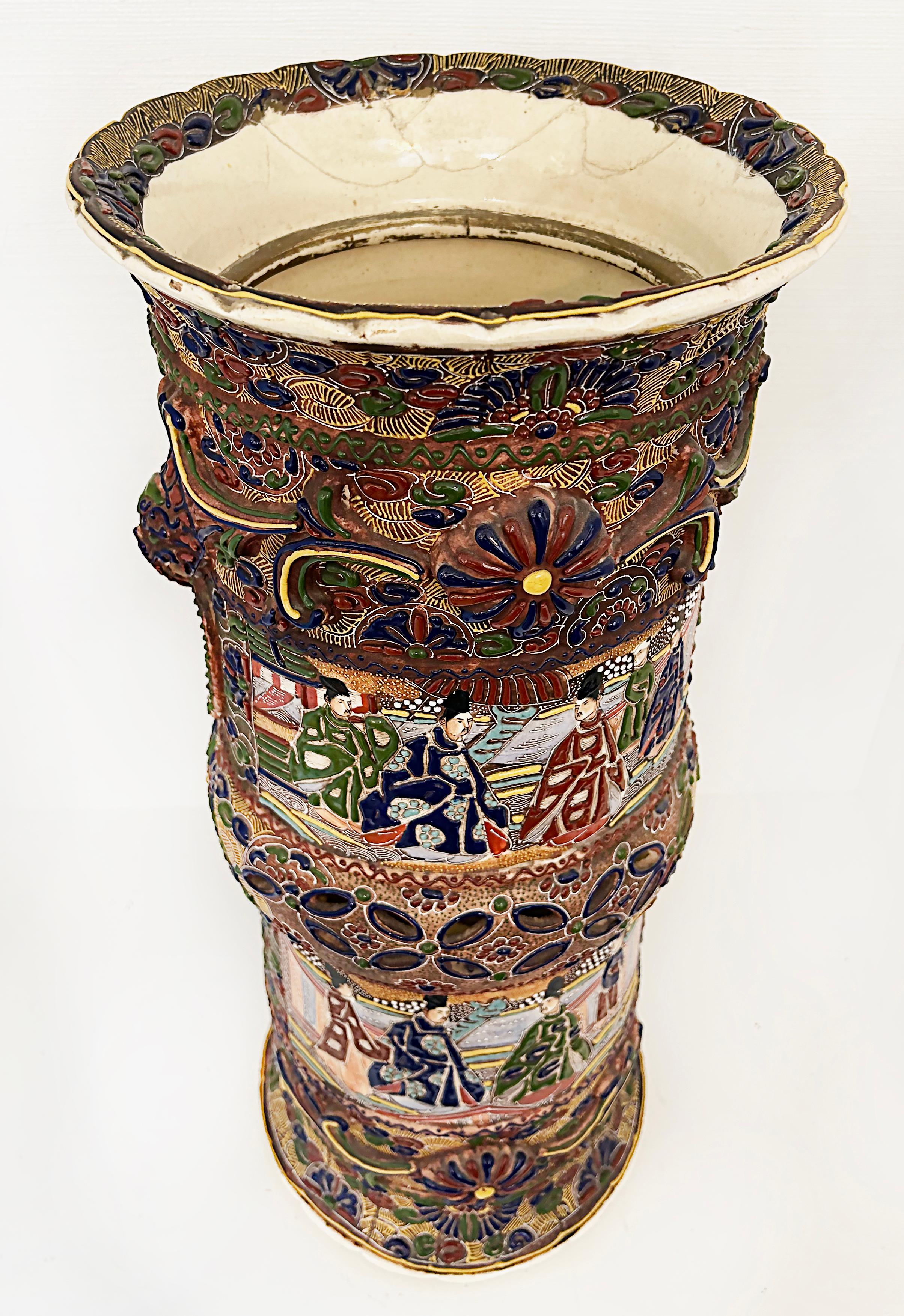 Japanese Imari Umbrella Walking Stick Stand

Offered for sale is an ornate early to mid-20th-century Japanese raised-enamel Imari umbrella stand. The piece is heavily decorated around the complete surface. There are older repairs as shown.