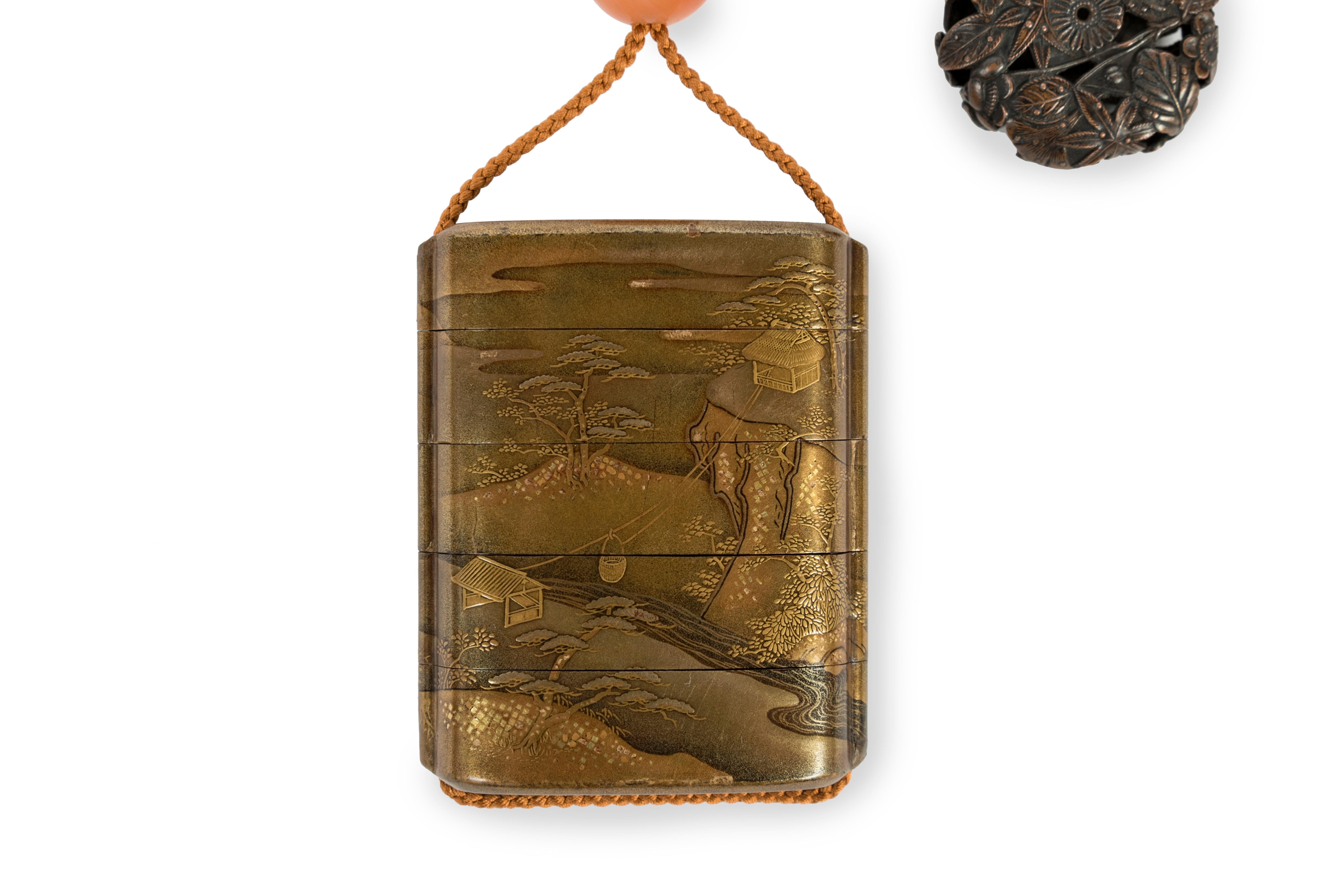 Lacquered Japanese inro of the edo period adorned with a landscape houses near a lake For Sale