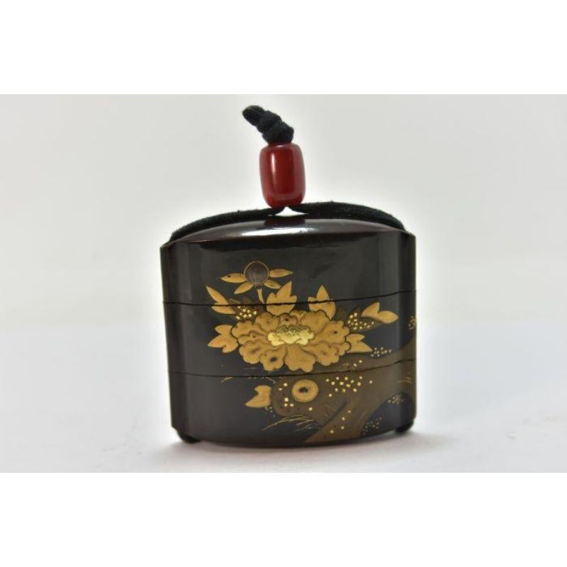 19th Century Japanese inro with 3 lacquered wooden compartments, 63 x 70 x 22 mm in size. Weight 39.1 g.

Additional information:
Material: Lacquered wood.
 
