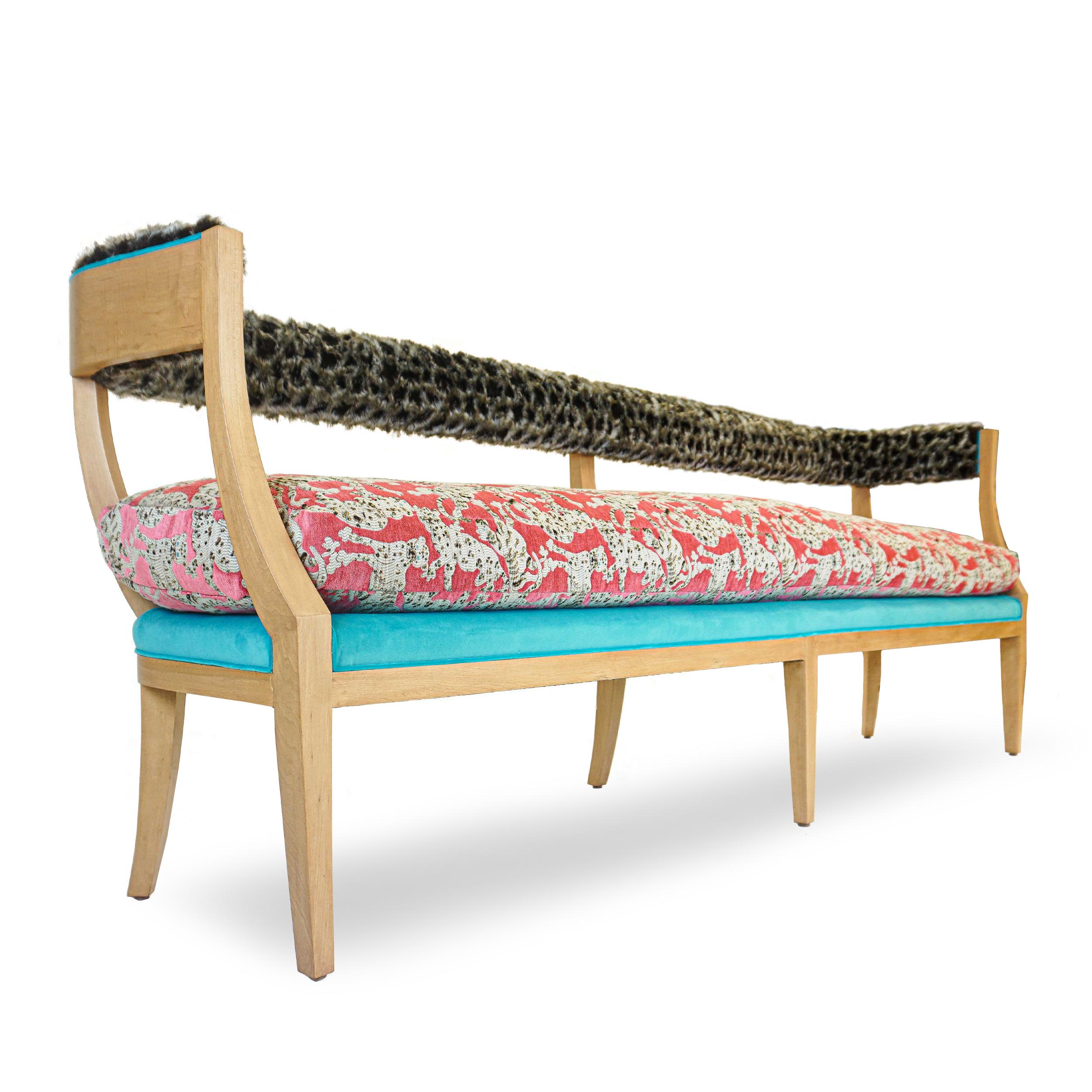 Japanese inspired bench in supple maple frame with matte finish is adorned with an unexpected mix of fabrics giving it a vibrant pop. Sink into a single oversized stuffed down feather seat cushion wrapped in Jim Thompson woven Cat's Pyjamas fabric.